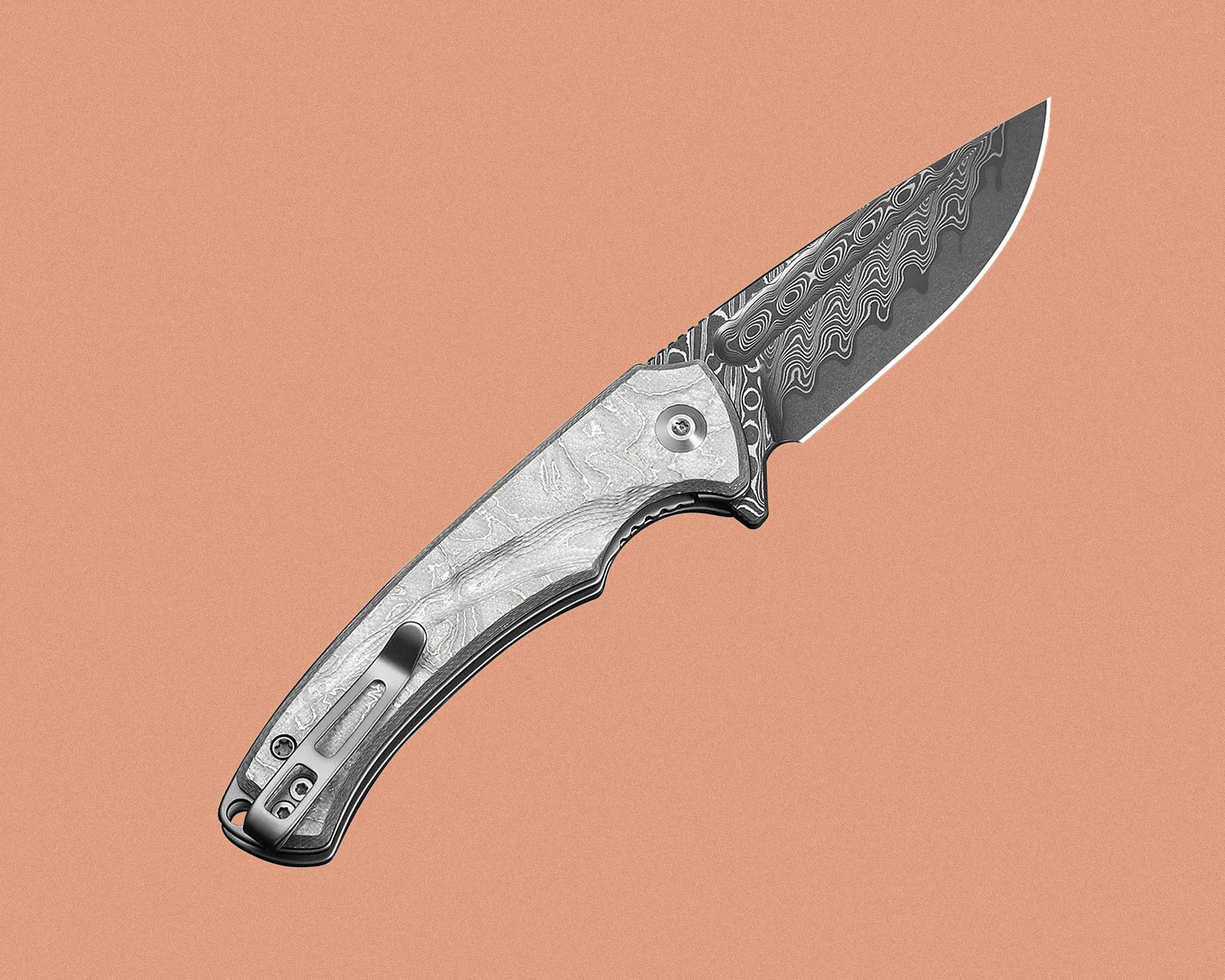Folding knife with a patterned Damascus steel blade and a textured silver handle with a black pocket clip.