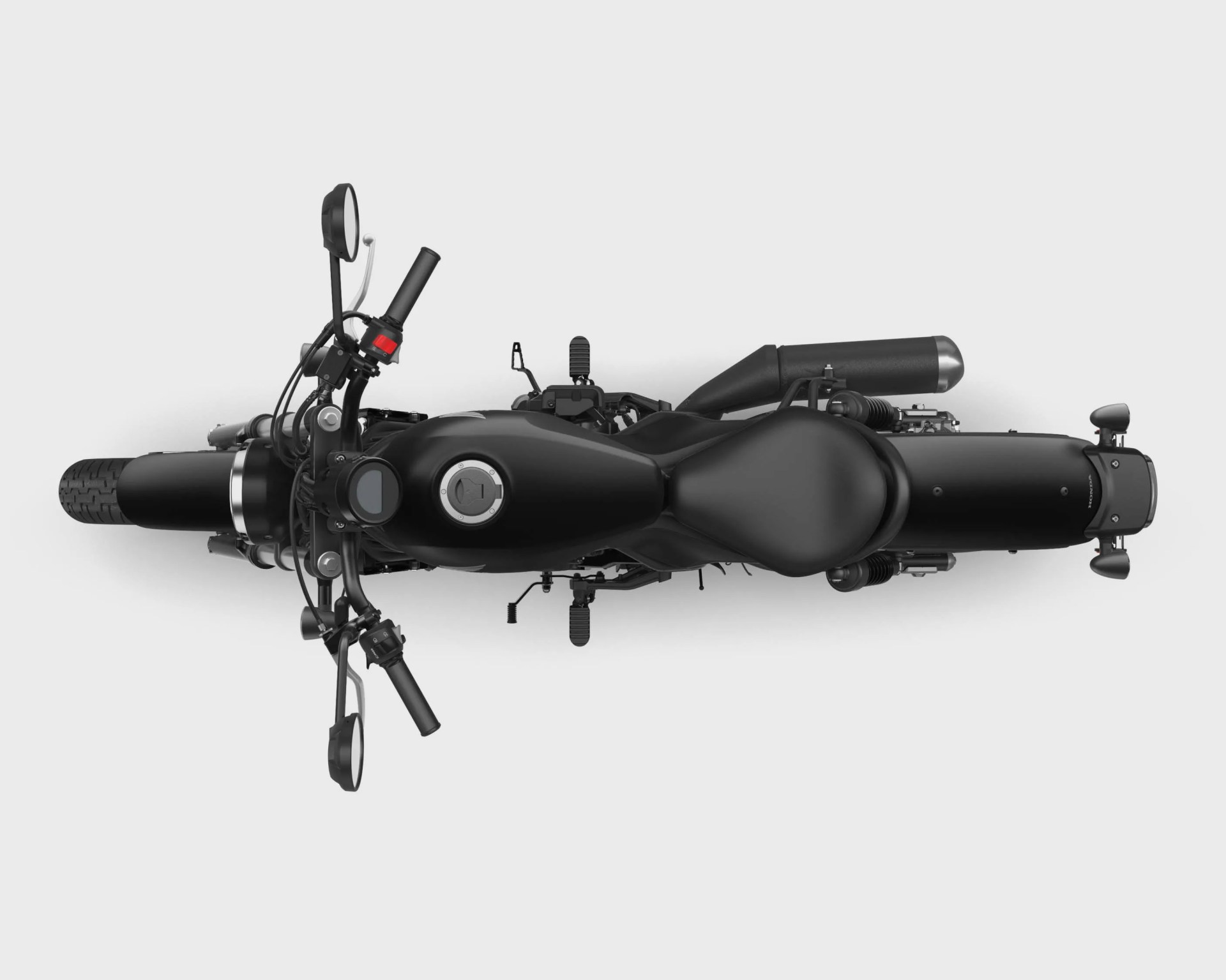 Top-down view of a matte black motorcycle showing the seat, fuel tank, handlebars, and rear exhaust.