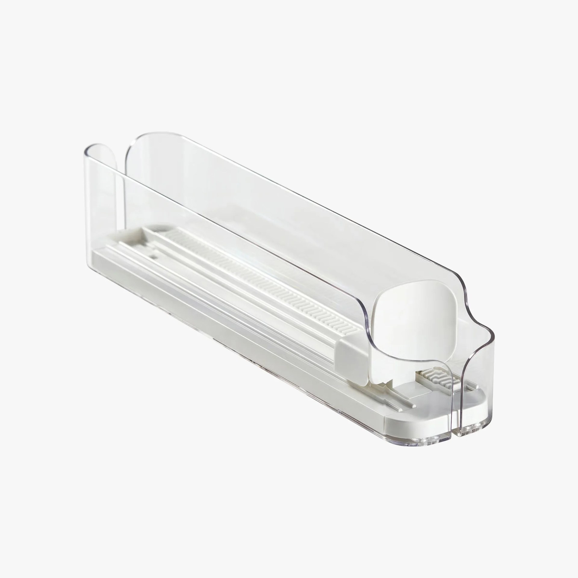 Clear plastic and white adjustable drawer organizer tray with rounded ends.