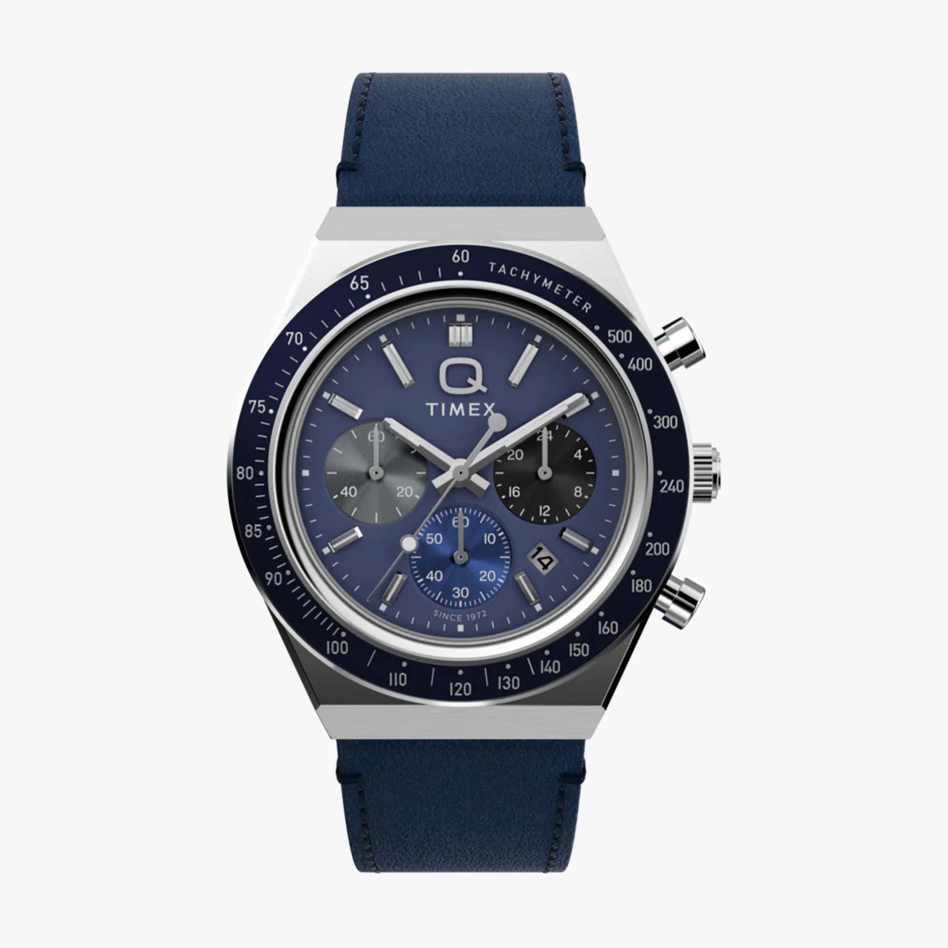 Blue Timex Q chronograph watch with stainless steel case and navy leather strap.
