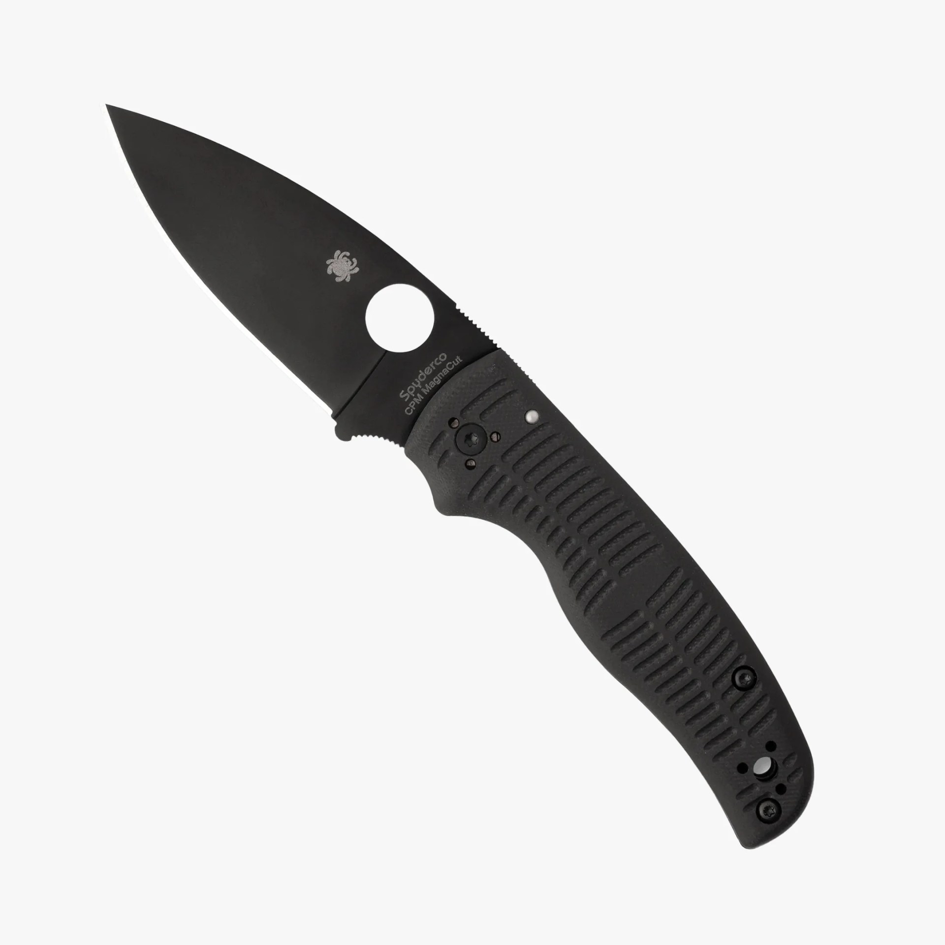 Black folding knife with textured handle and partially serrated blade marked "Spyderco CPM MagnaCut.