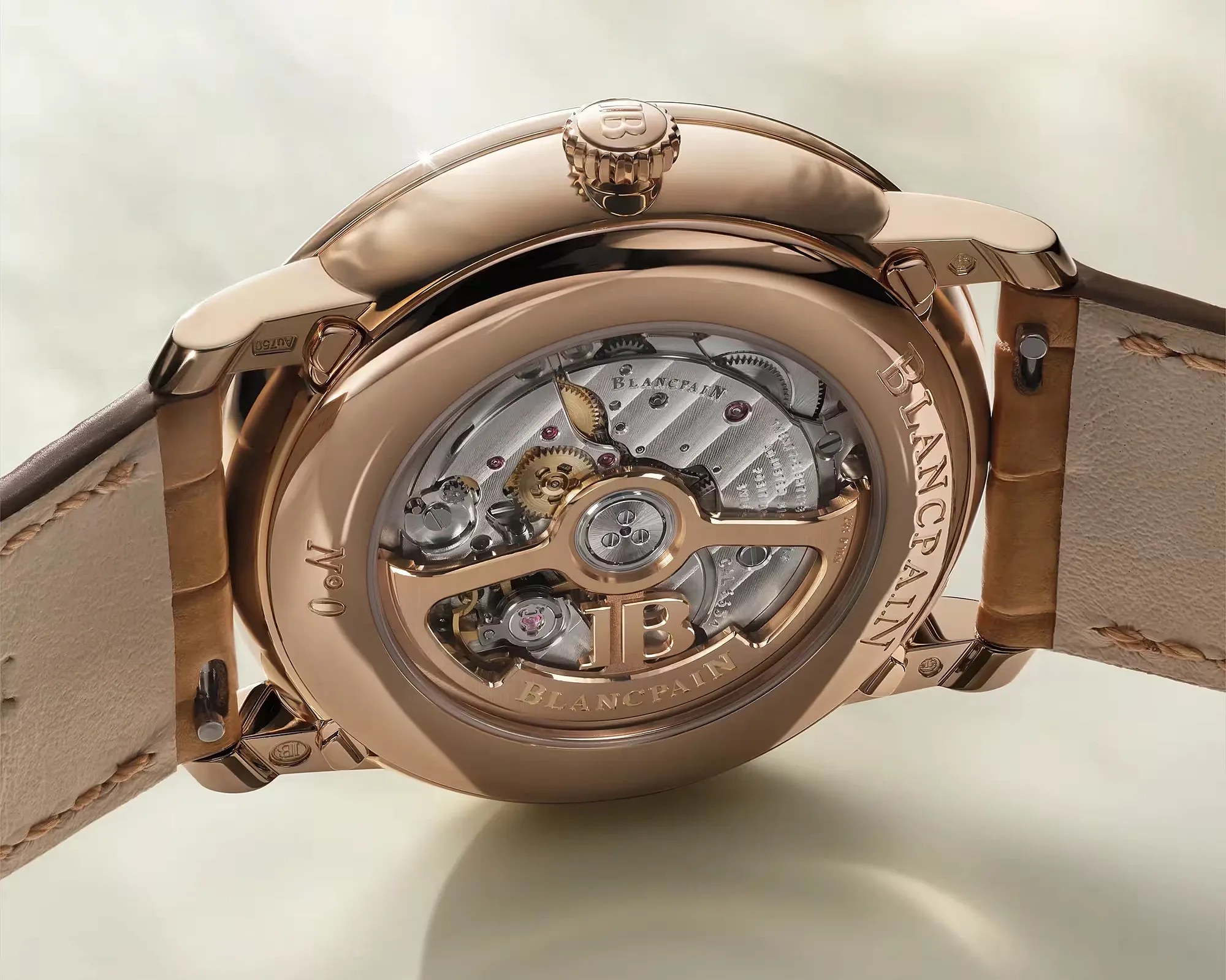 Rose gold Blancpain wristwatch back showing intricate mechanical movement through transparent case back.