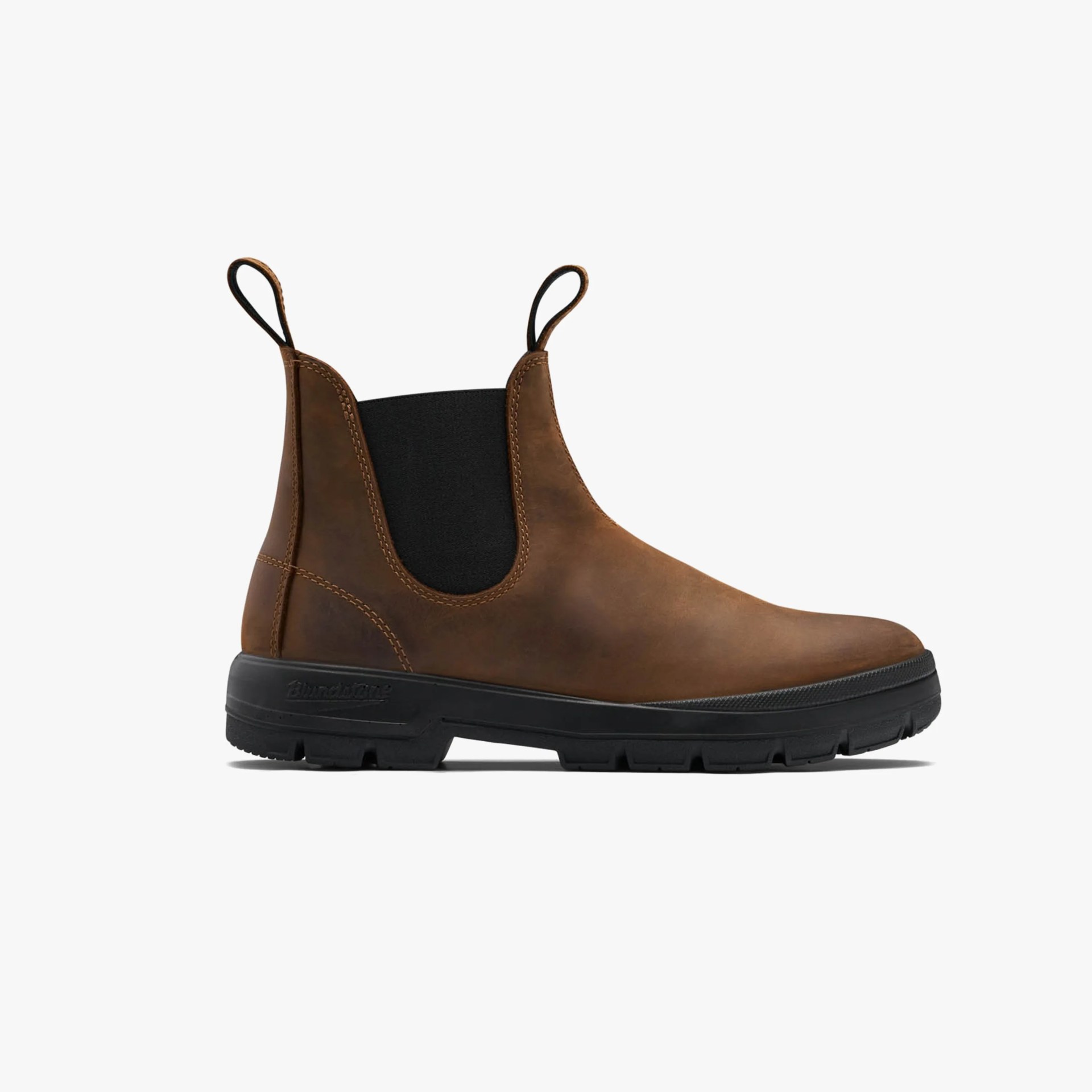Brown leather Chelsea boot with black elastic side panels and black rubber sole.
