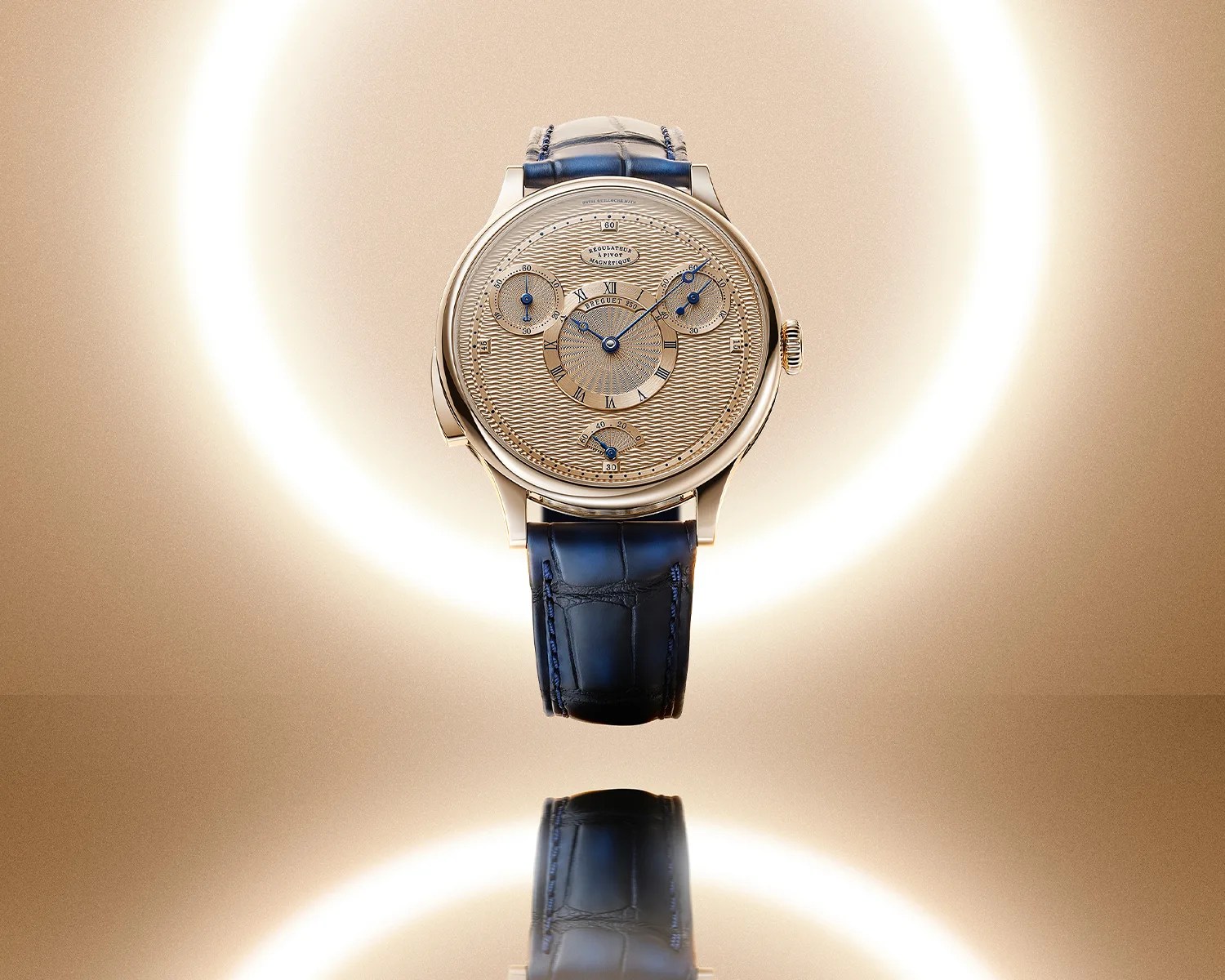 Luxury gold wristwatch with intricate dial, blue hands, and black leather strap, reflected on a glossy surface.