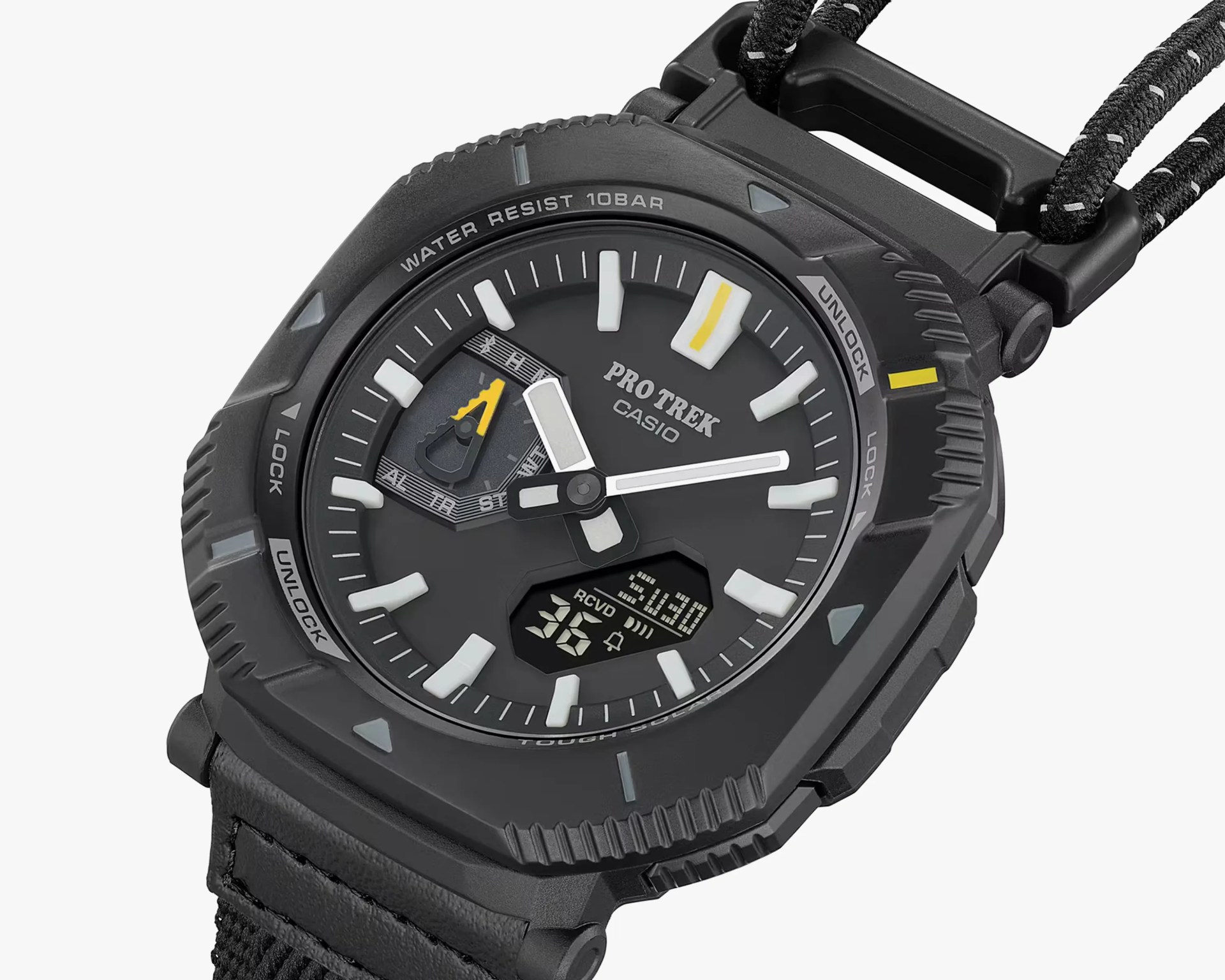 Black Casio Pro Trek analog-digital watch with white and yellow accents and fabric strap.