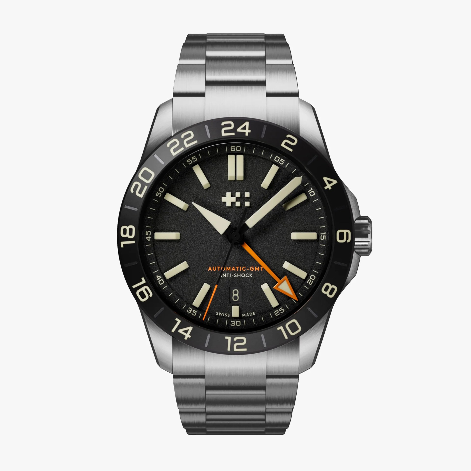 Stainless steel wristwatch with black dial, beige hour markers, orange GMT hand, and black 24-hour bezel.