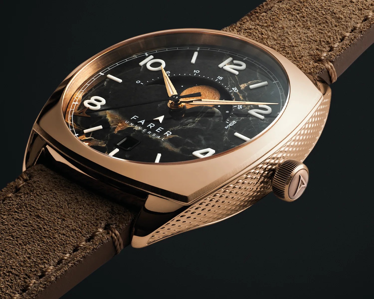 Rose gold textured metal watch case with black marbled dial, white numerals, gold hands, and brown suede strap.