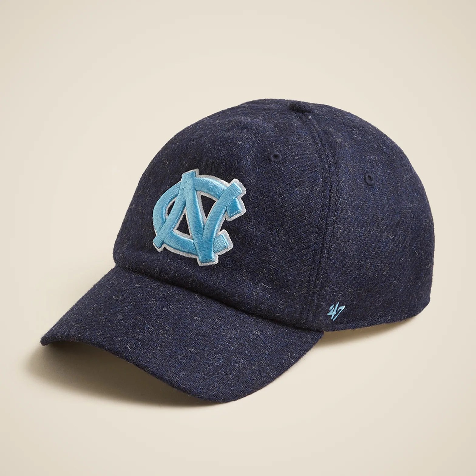a wool baseball cap with the University of North Carolina logo.