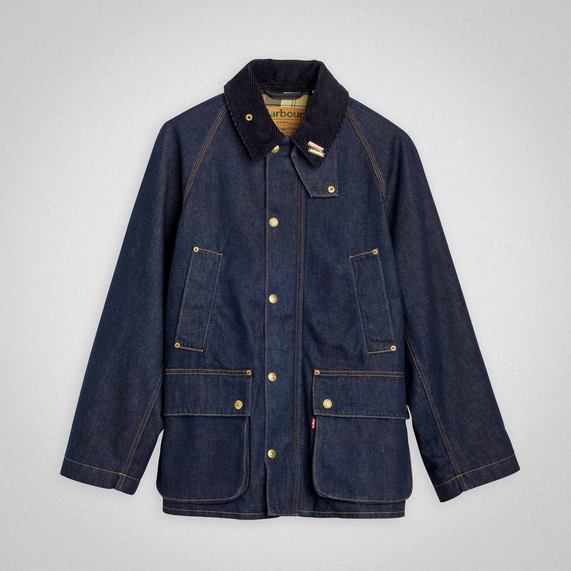 Dark blue denim jacket with black corduroy collar and multiple front pockets on a gray background.