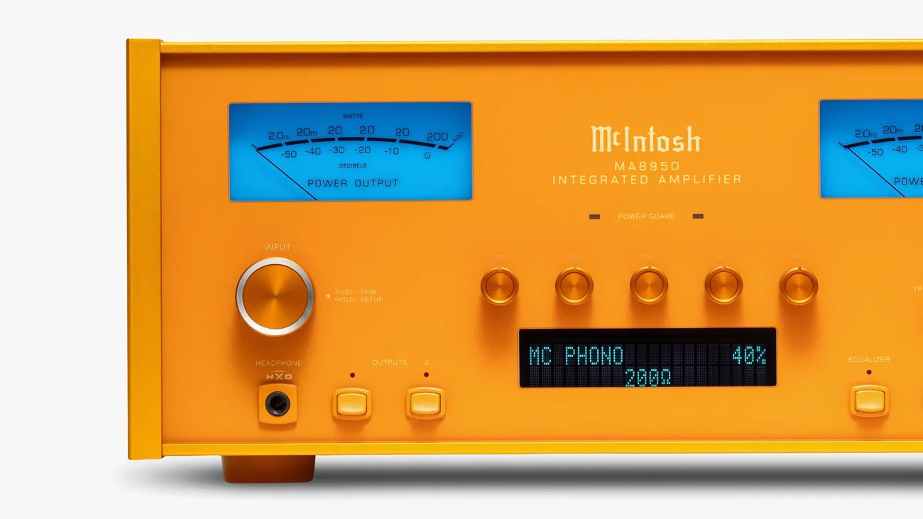 Orange McIntosh MA8950 integrated amplifier with blue power output meters and digital display showing "MC PHONO 40%".