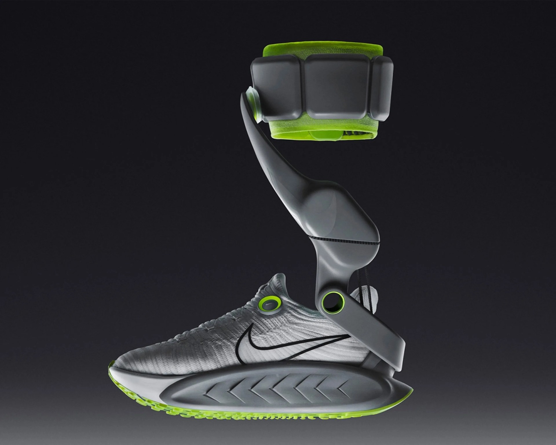 Gray and neon green Nike sneaker integrated with a futuristic robotic ankle brace against a dark background.