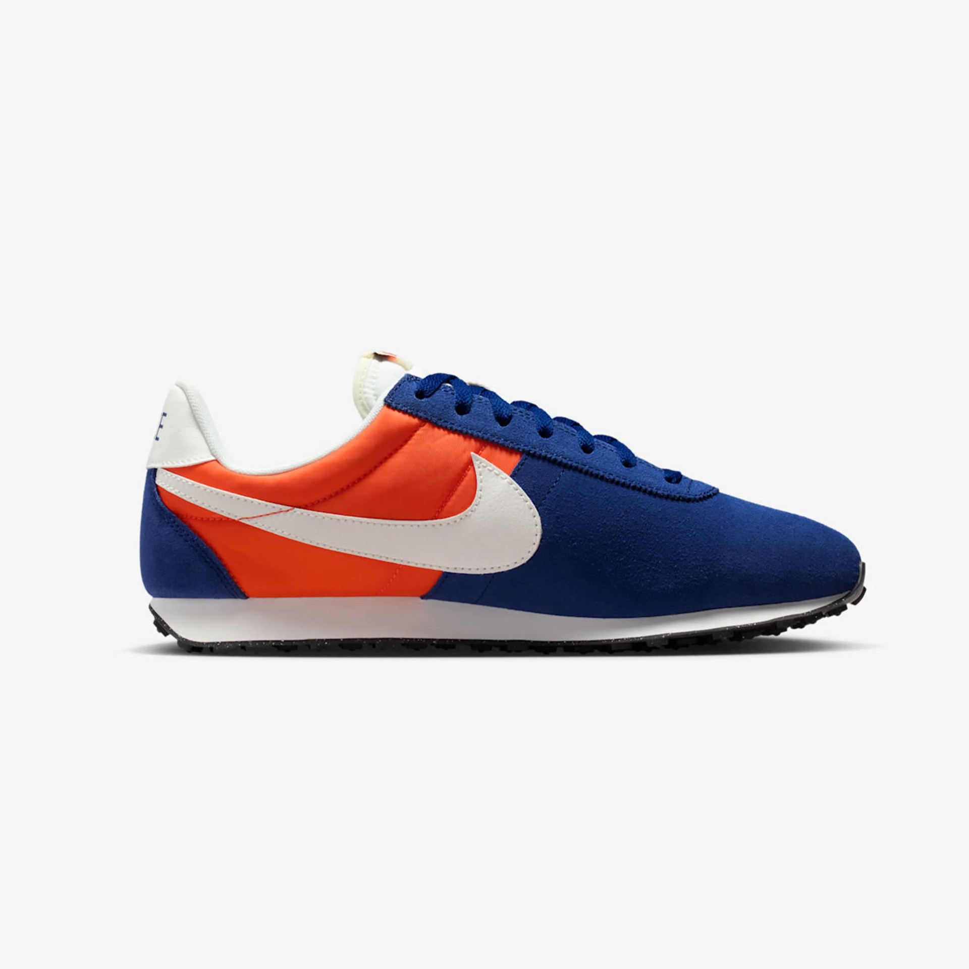 Blue and orange Nike sneaker with white swoosh and black sole, side view.