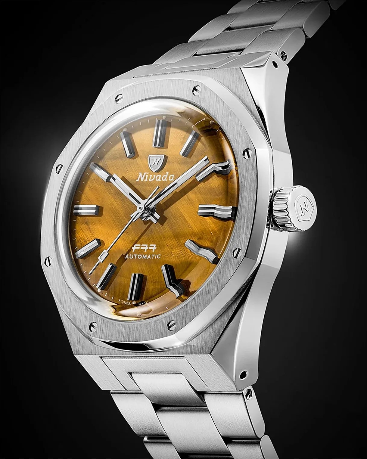 Silver stainless steel wristwatch with a brown tiger's eye dial and bold hour markers.