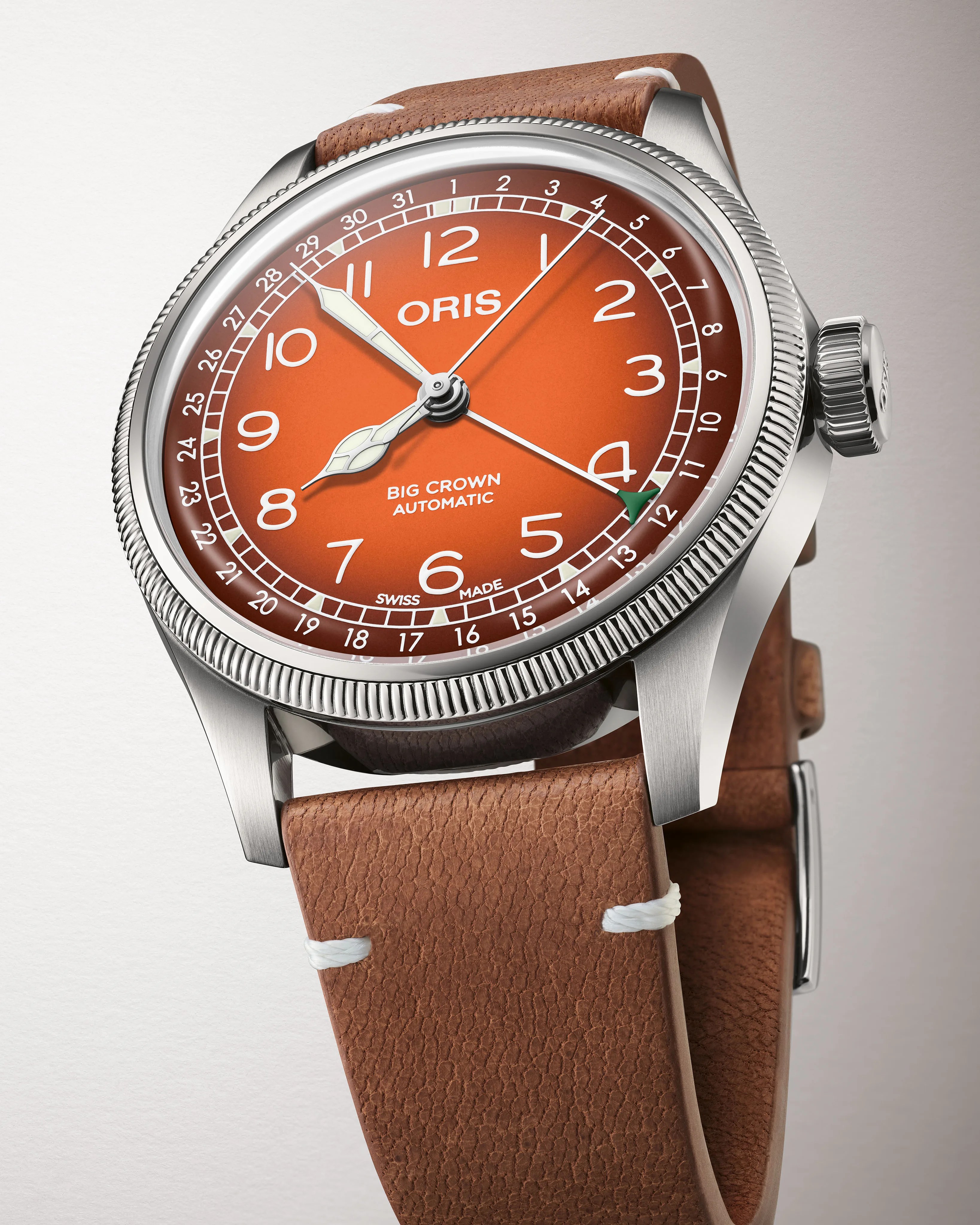 Oris Makes a Strong Case that Orange Is the New Black for Classic