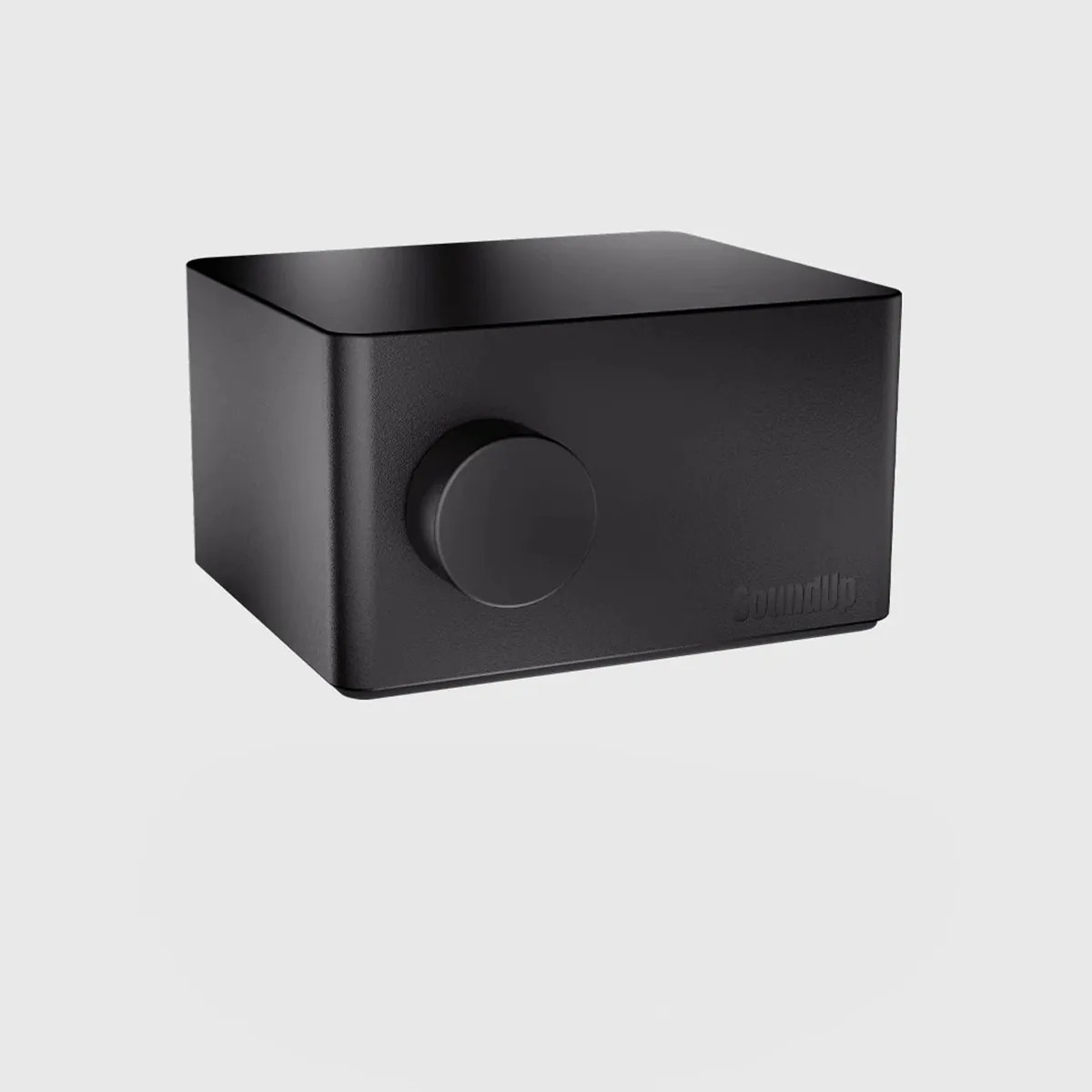 Black rectangular electronic device with a large round knob on the front and subtle embossed branding.