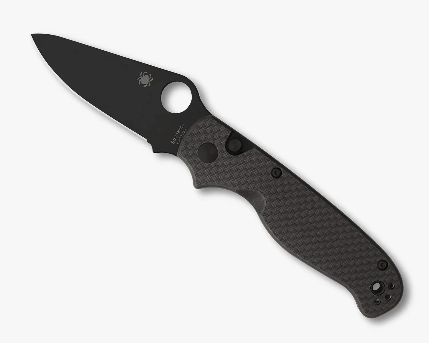 Black folding knife with textured dark gray handle and circular thumb hole near the blade base.