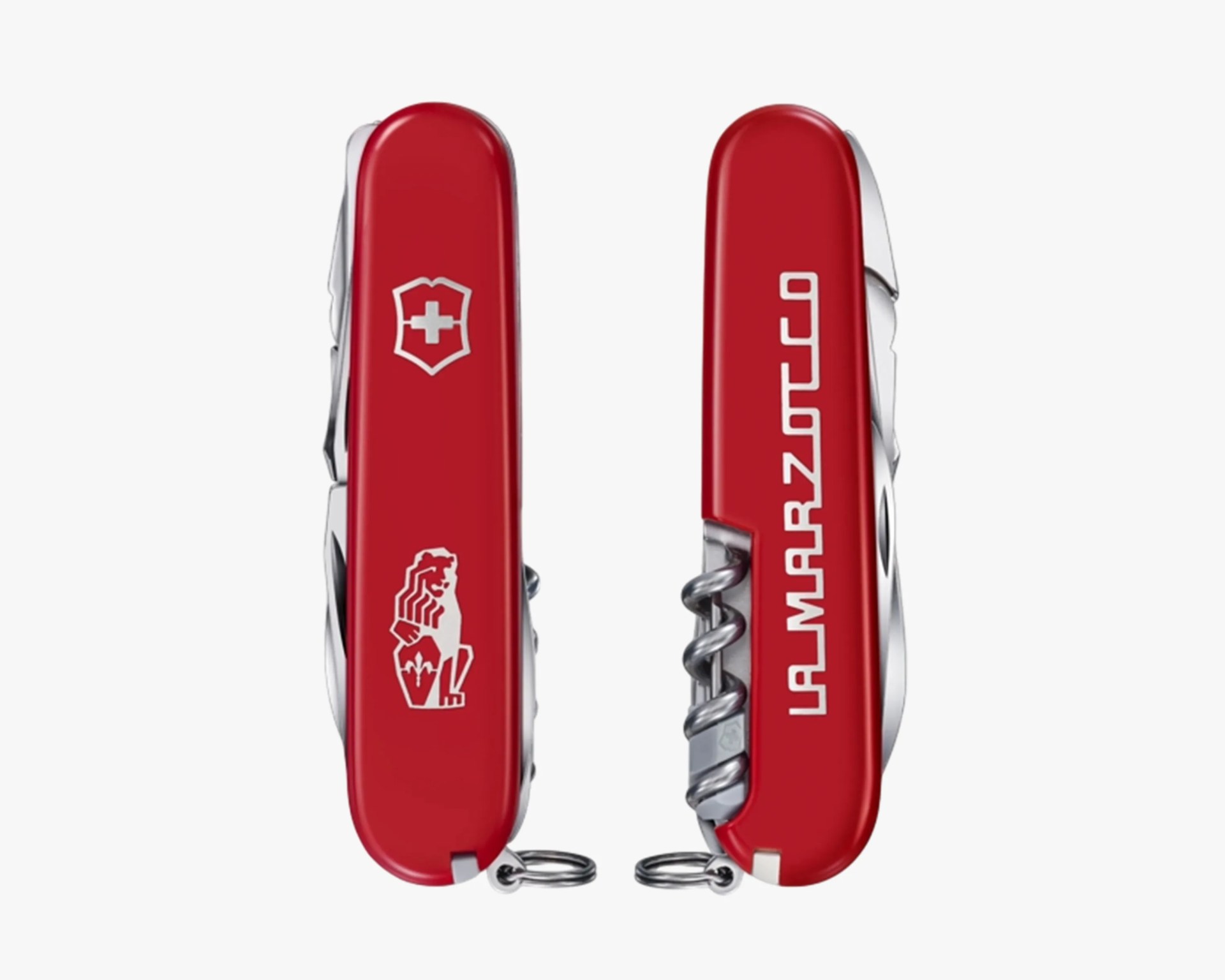 Two views of a red Swiss Army knife with silver tools, one side showing a white cross shield and lion emblem, the other side showing "LA MARZOCCH" text.