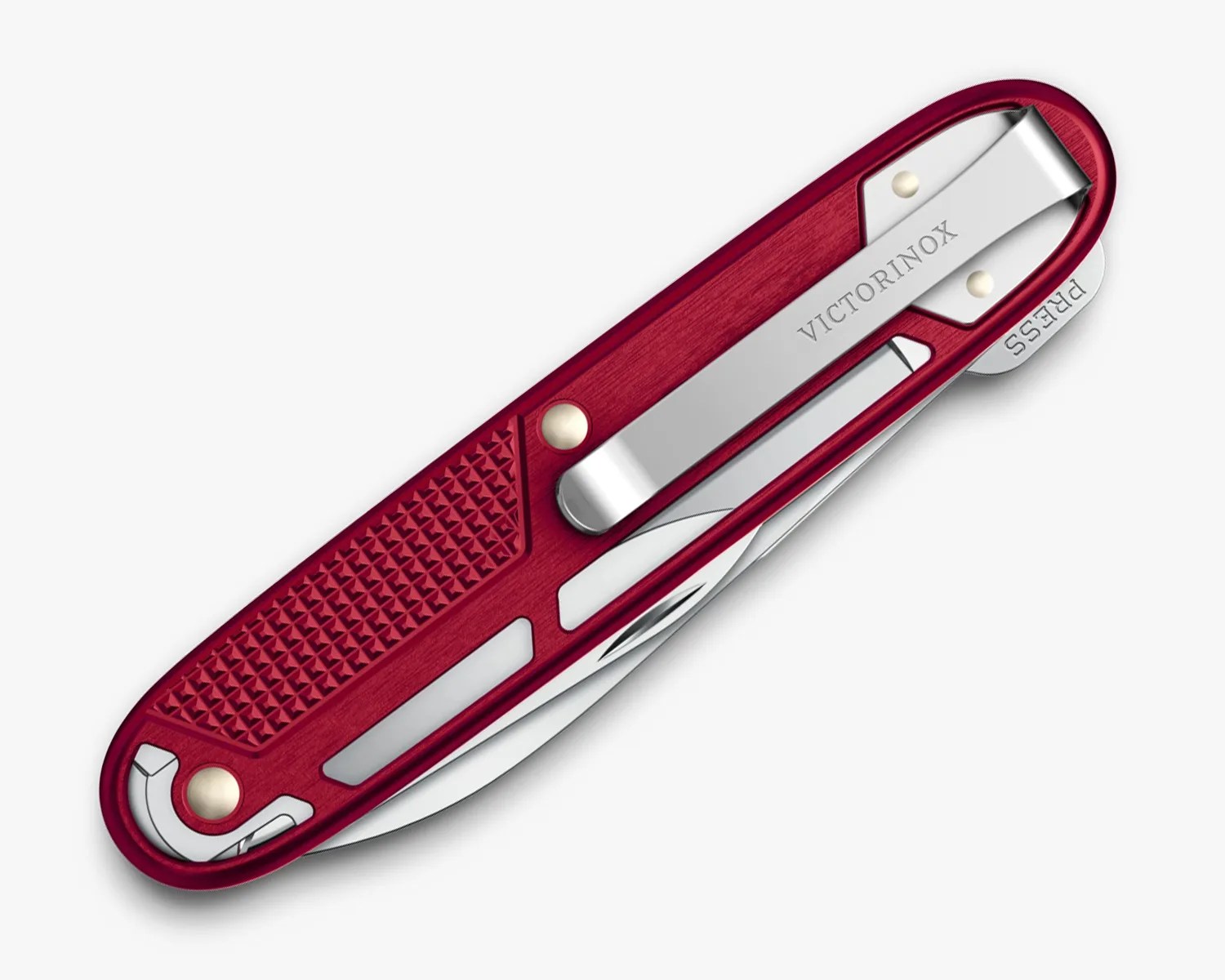 Red Victorinox Swiss Army knife with textured grip and metal clip on a white background.
