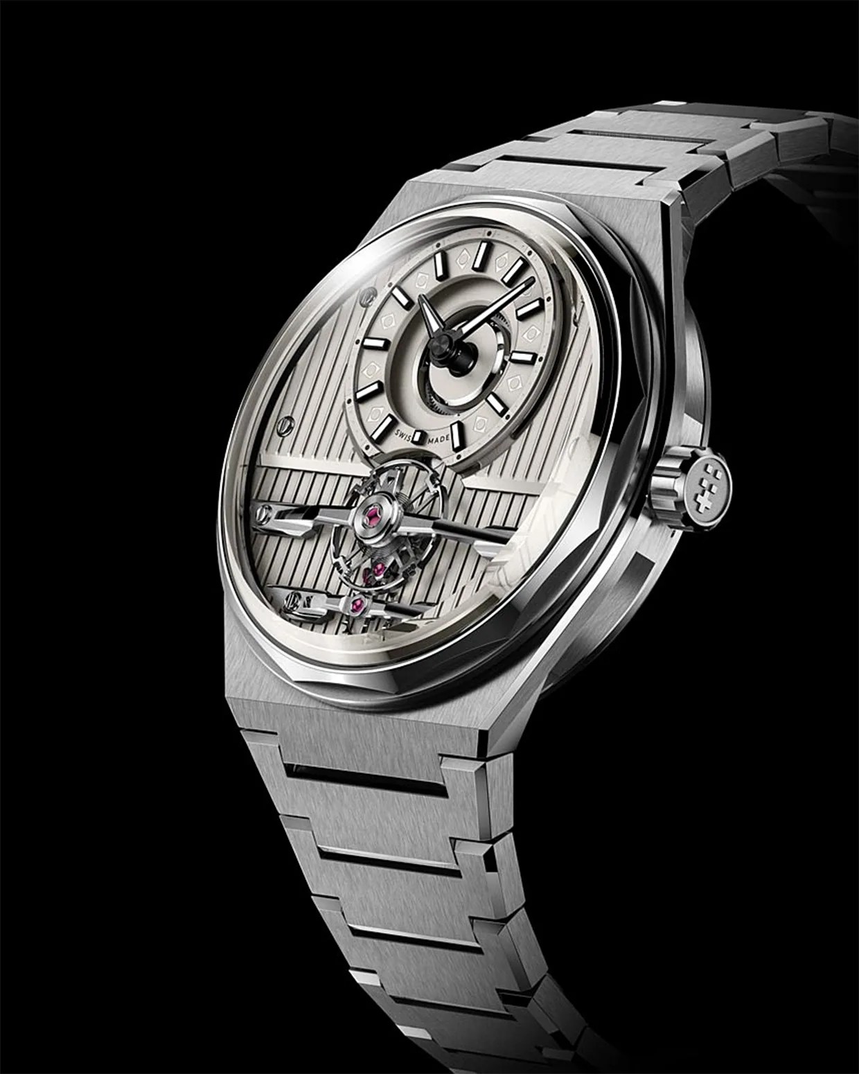 Silver stainless steel wristwatch with a textured dial, black and white hour markers, and visible mechanical components.