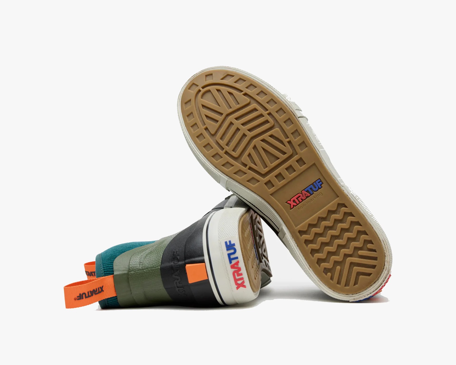 Pair of green and black high-top sneakers with orange pull tabs and gum soles showing "XTRATUF" branding.