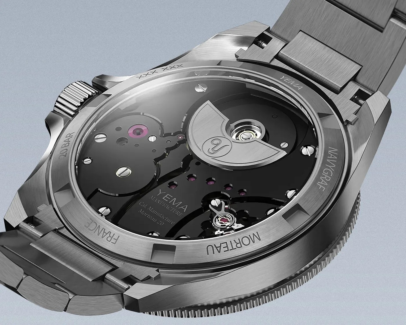 Close-up of the back of a Yema Navgraf steel watch showing the automatic movement through a transparent case back.