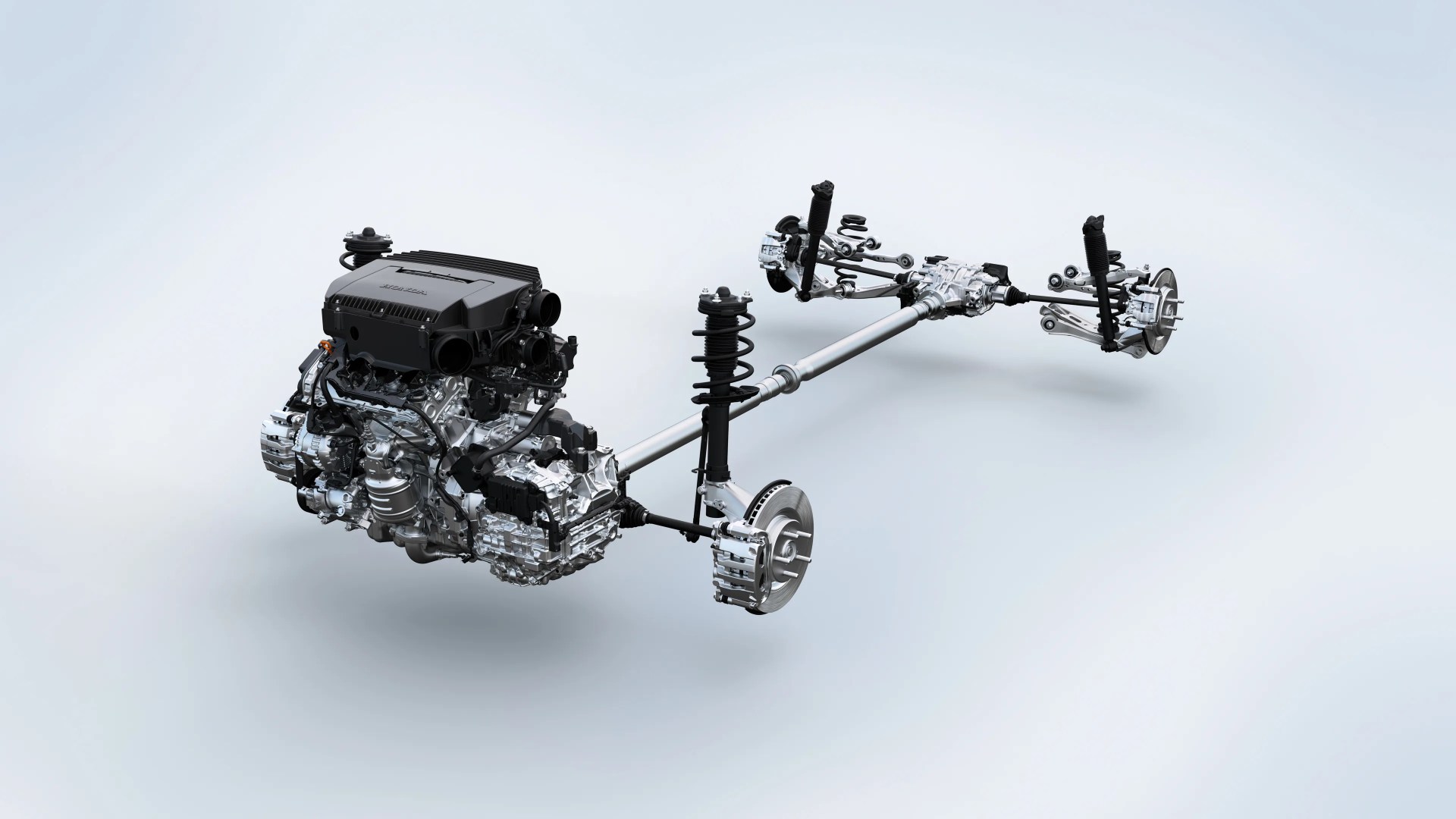 Car engine and drivetrain assembly with suspension components isolated on a light background.