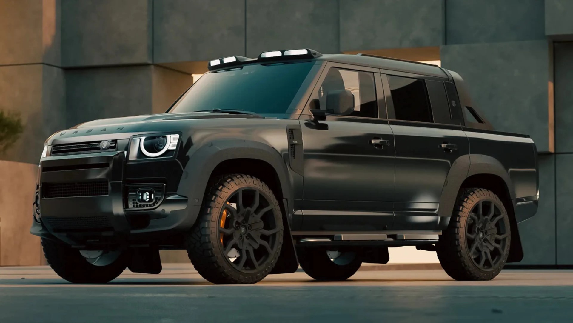 Black Urban electric pickup truck with rugged tires and roof lights parked in front of a modern building.