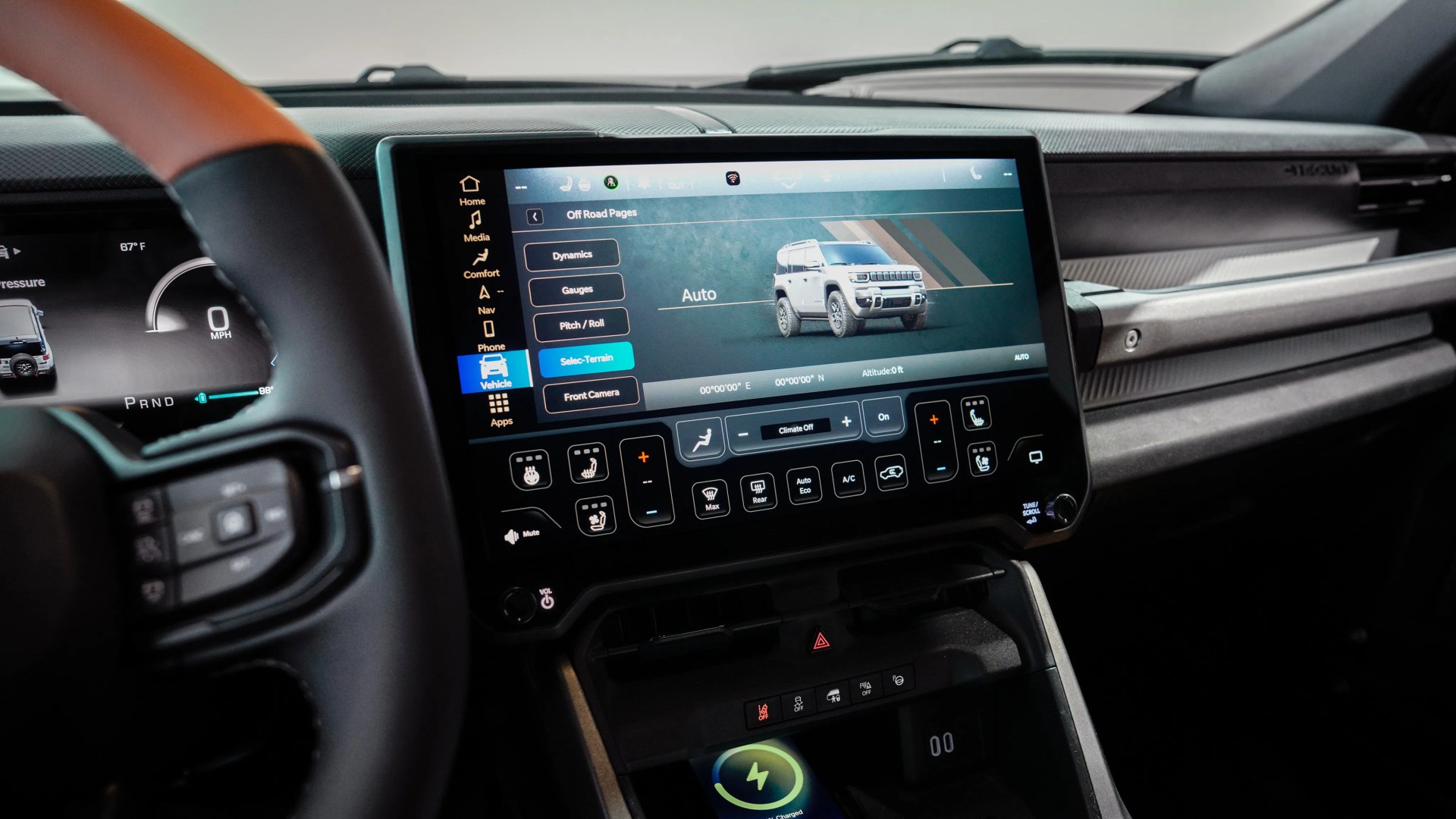 Touchscreen infotainment system displaying off-road vehicle settings inside a car dashboard.