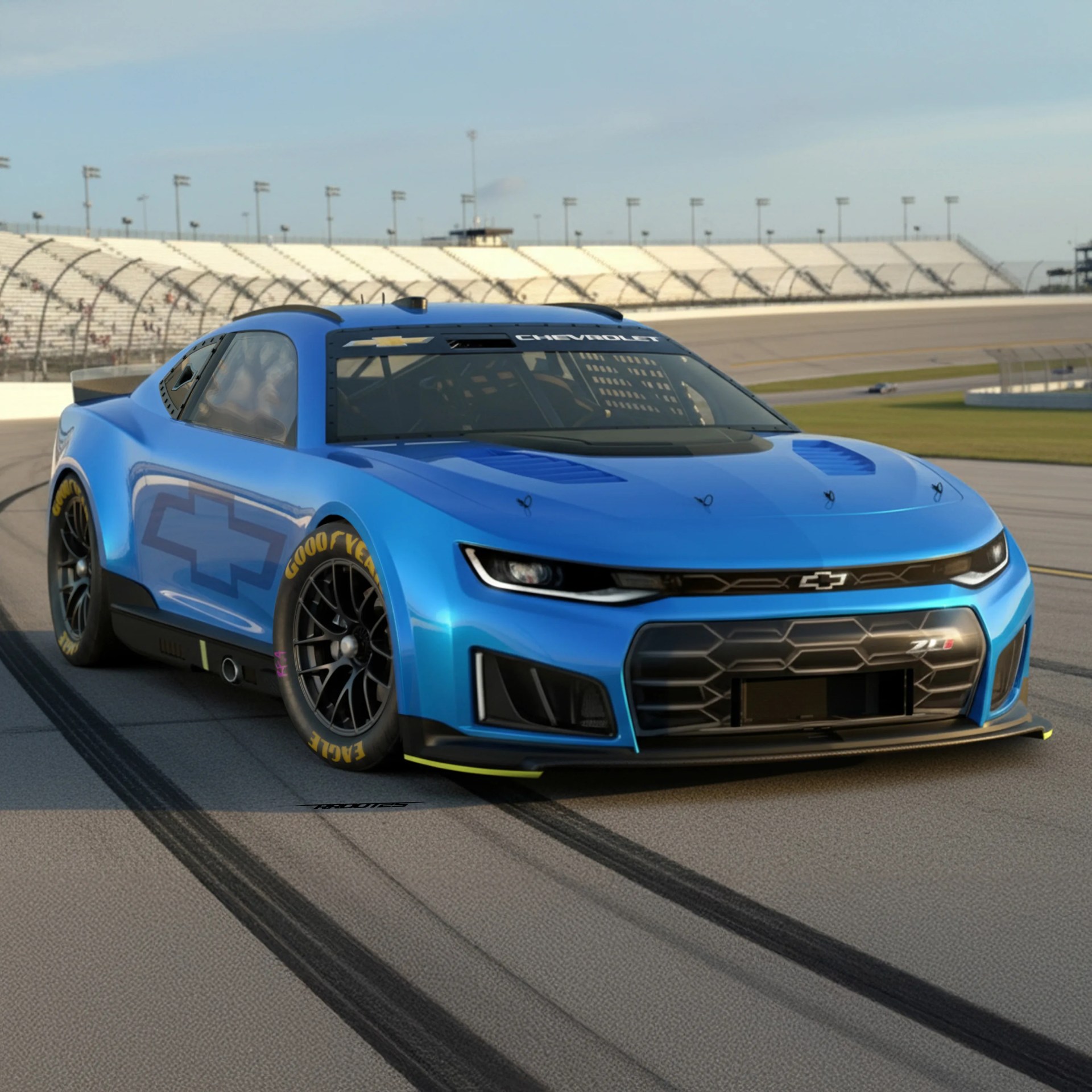 Blue Chevrolet ZL1 race car with black Goodyear tires on a racetrack with empty stands.