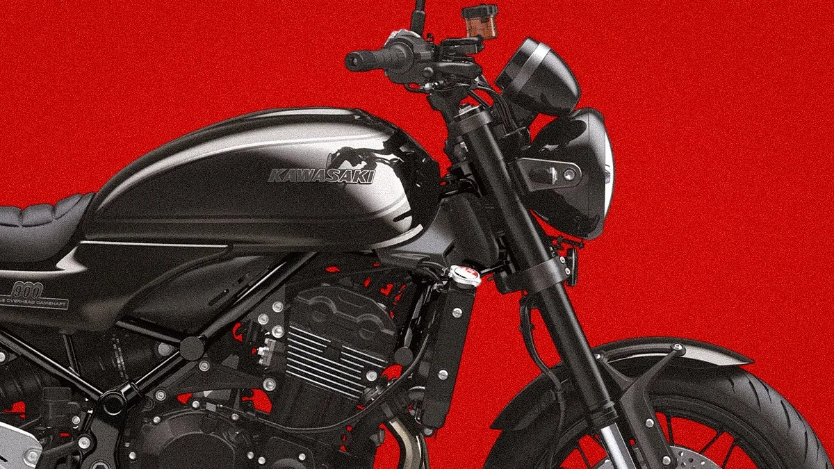 Black Kawasaki motorcycle tank and front fork against a red background.