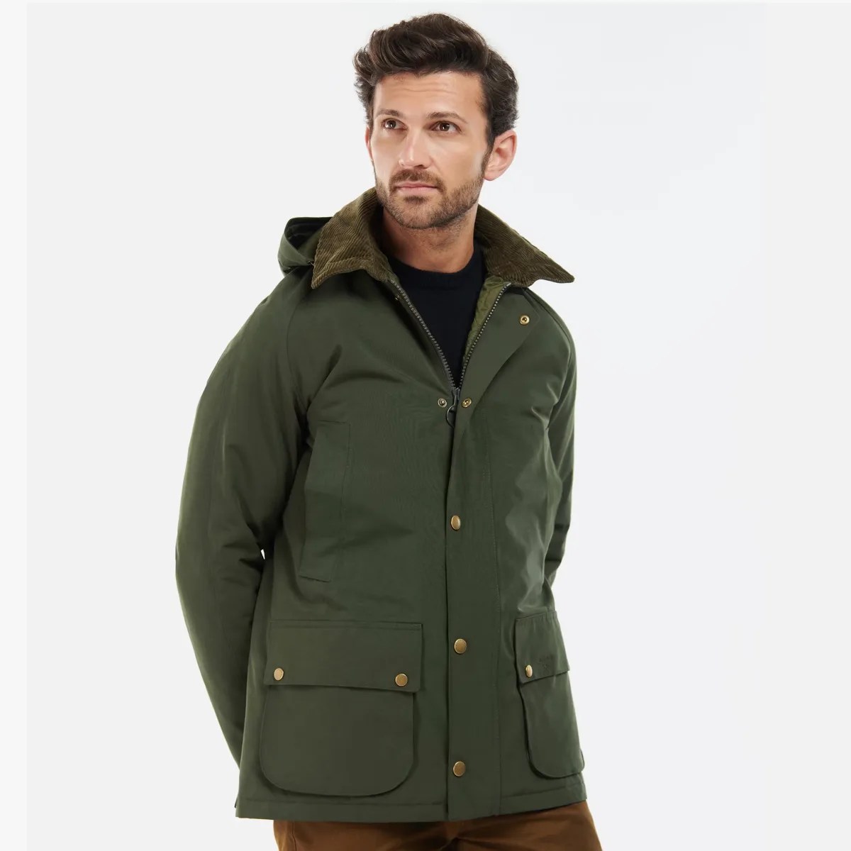 Olive green hooded jacket with corduroy collar and front flap pockets worn by a man.