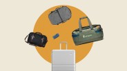 Silver hard-shell suitcase with extended handle, green Cotopaxi duffel bag, black leather-accented bag, gray bag, and blue glasses case.