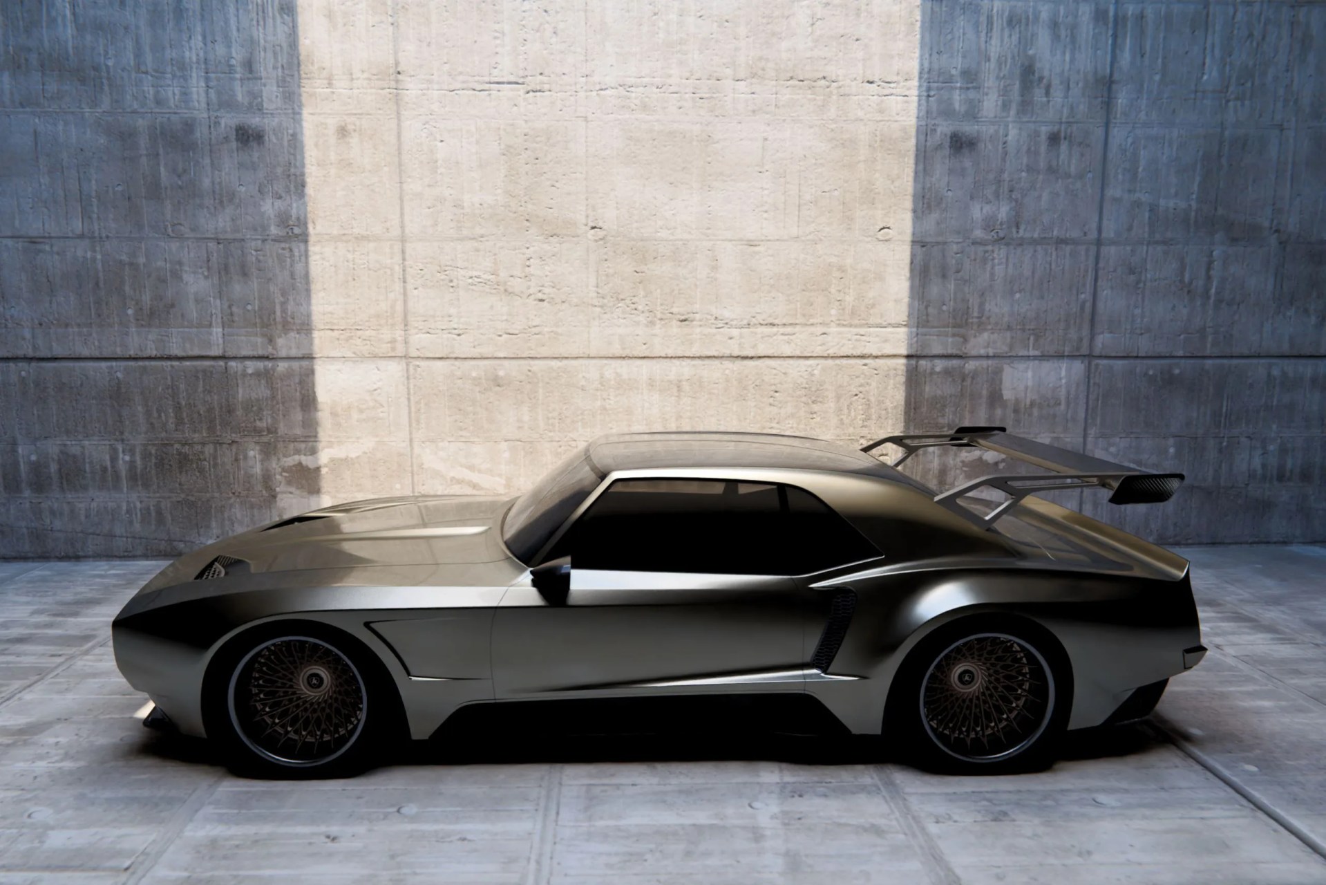 Sleek metallic gray sports car with tinted windows and large rear spoiler parked against a concrete wall.