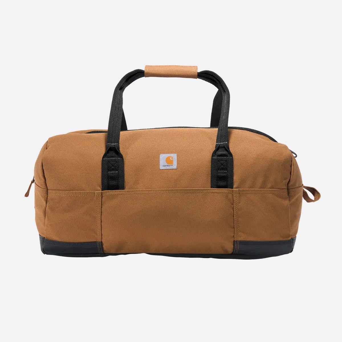Brown Carhartt duffel bag with black handles and bottom, featuring a front pocket and logo patch.