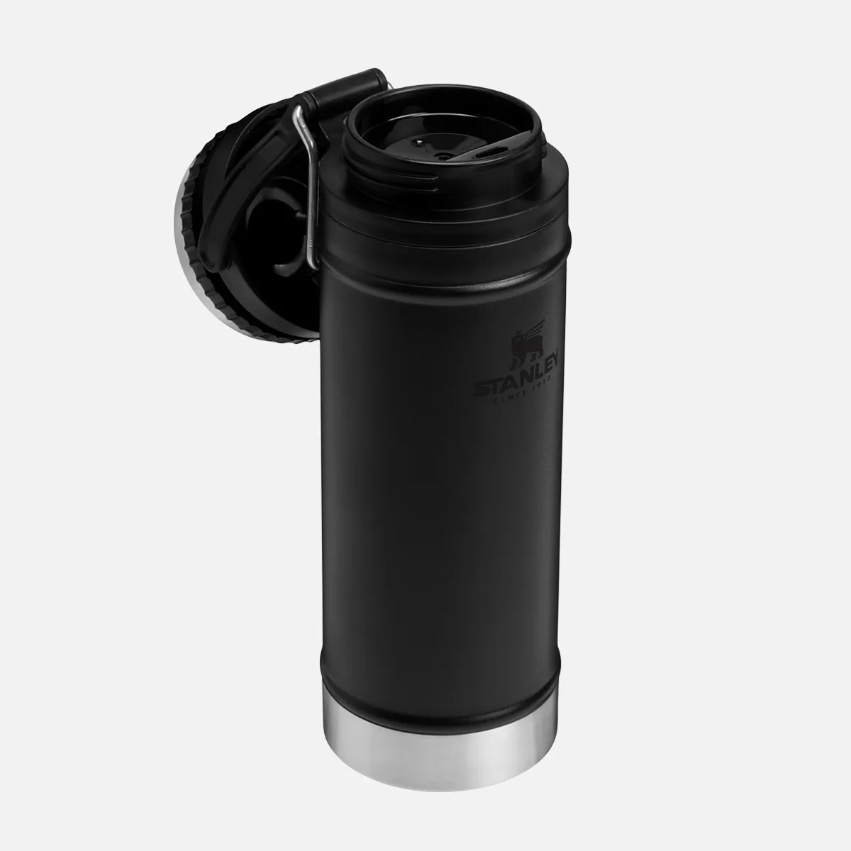 Matte black Stanley insulated water bottle with silver base and open screw-on lid.