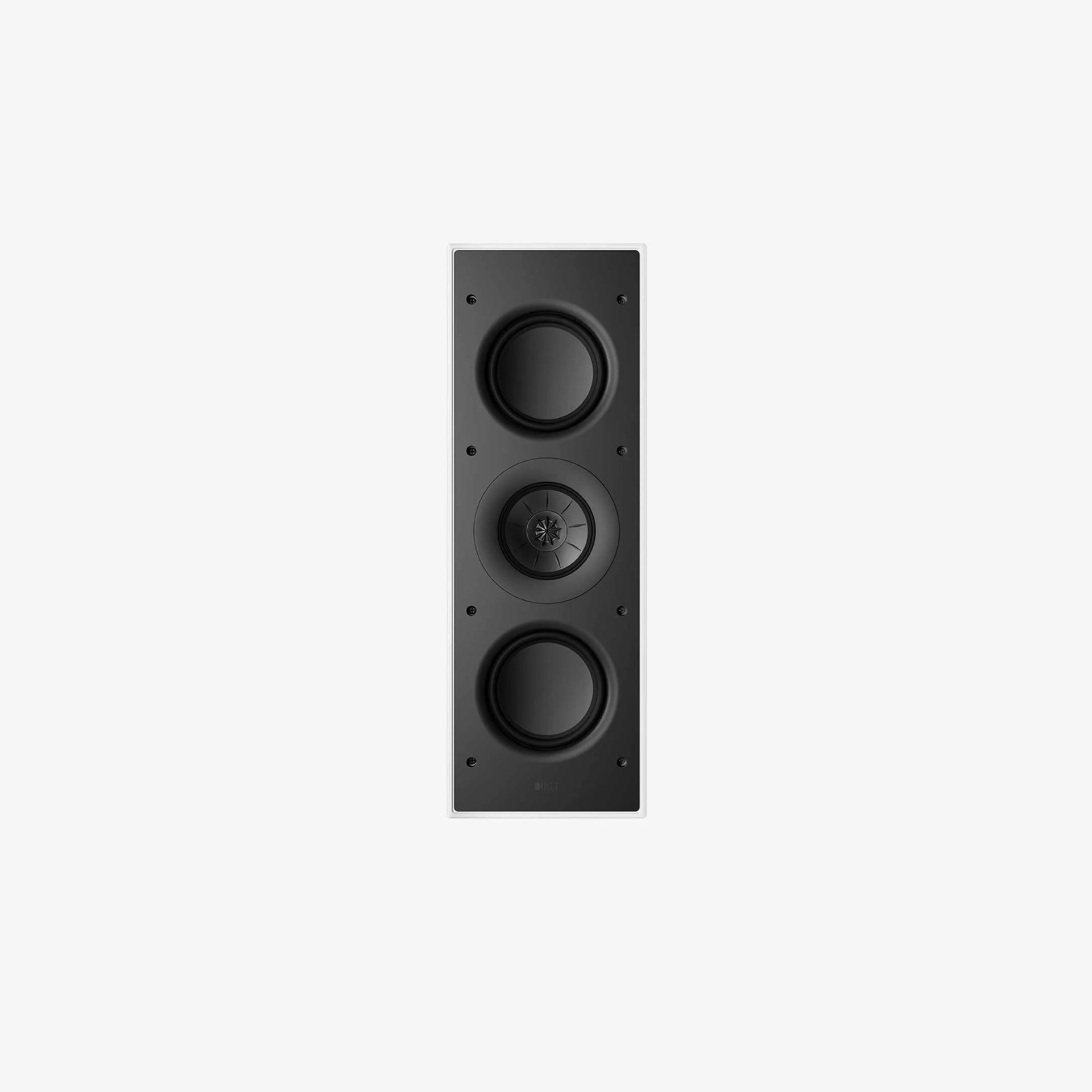 Rectangular in-wall speaker with two large black woofers and a central black tweeter in a white frame.