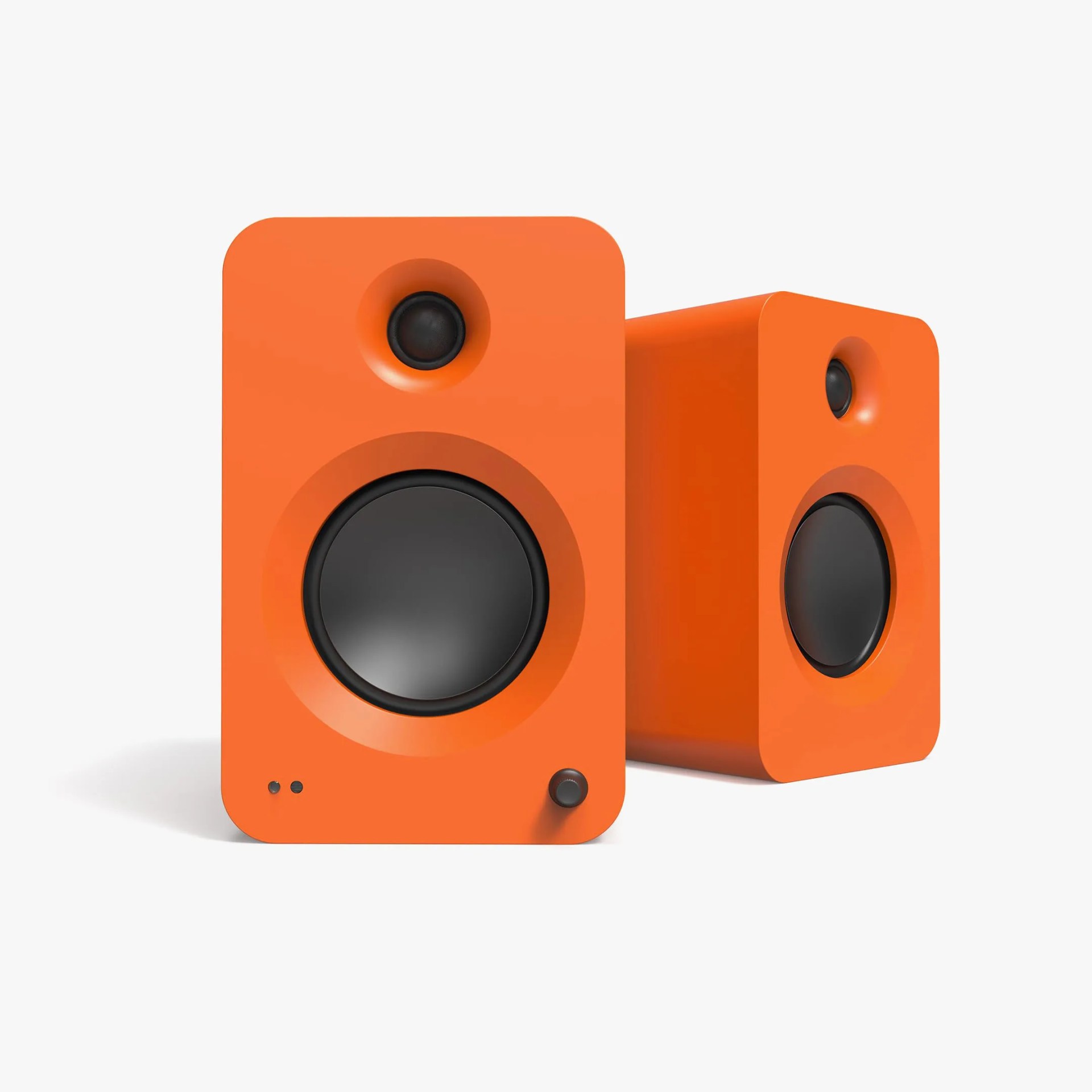 Pair of compact rectangular orange speakers with rounded edges and black speaker cones on a white background.