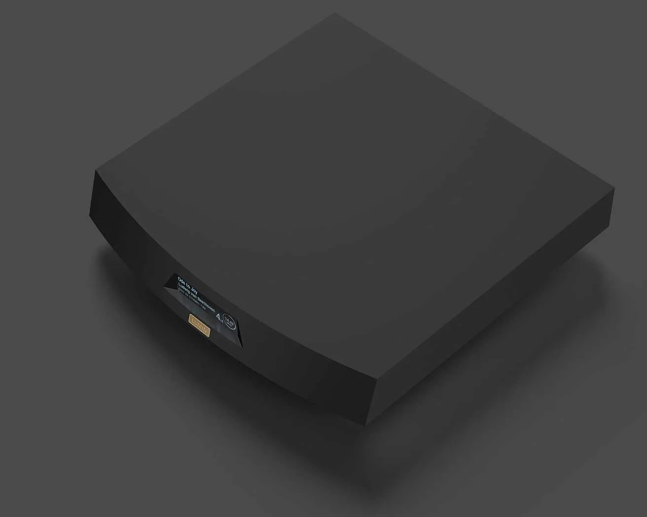 Black rectangular audio device with a small digital display and a gold "LUMIN" logo on the front.