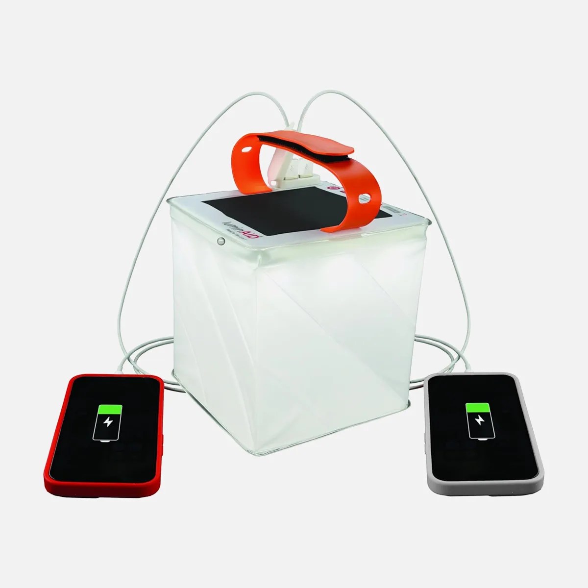 White collapsible solar lantern with an orange handle charging two smartphones via USB cables.