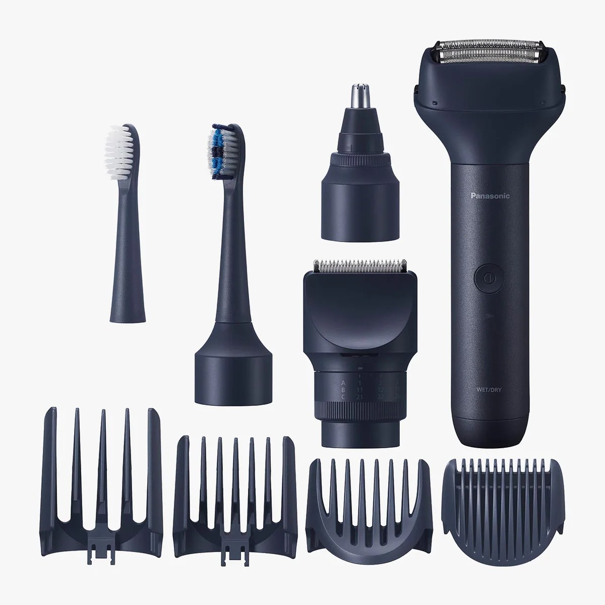 Black Panasonic electric shaver with multiple detachable grooming and trimming attachments on a white background.