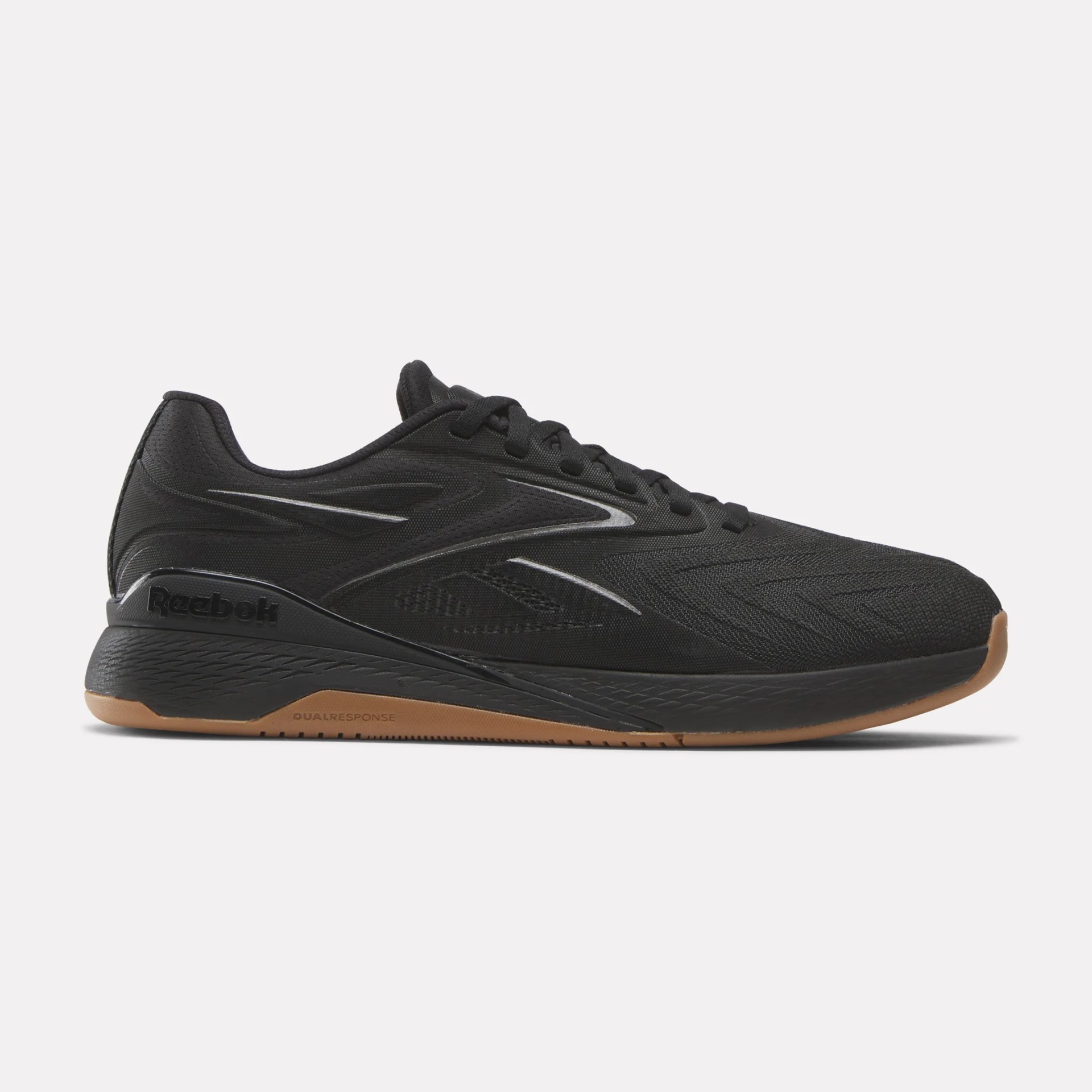 Black Reebok running shoe with gum sole and subtle silver accents on the side.