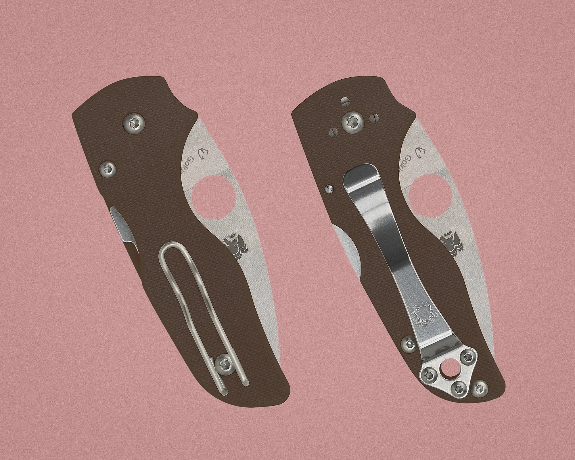 Two brown folding knives with textured handles and metal clips, shown closed on a pink background.
