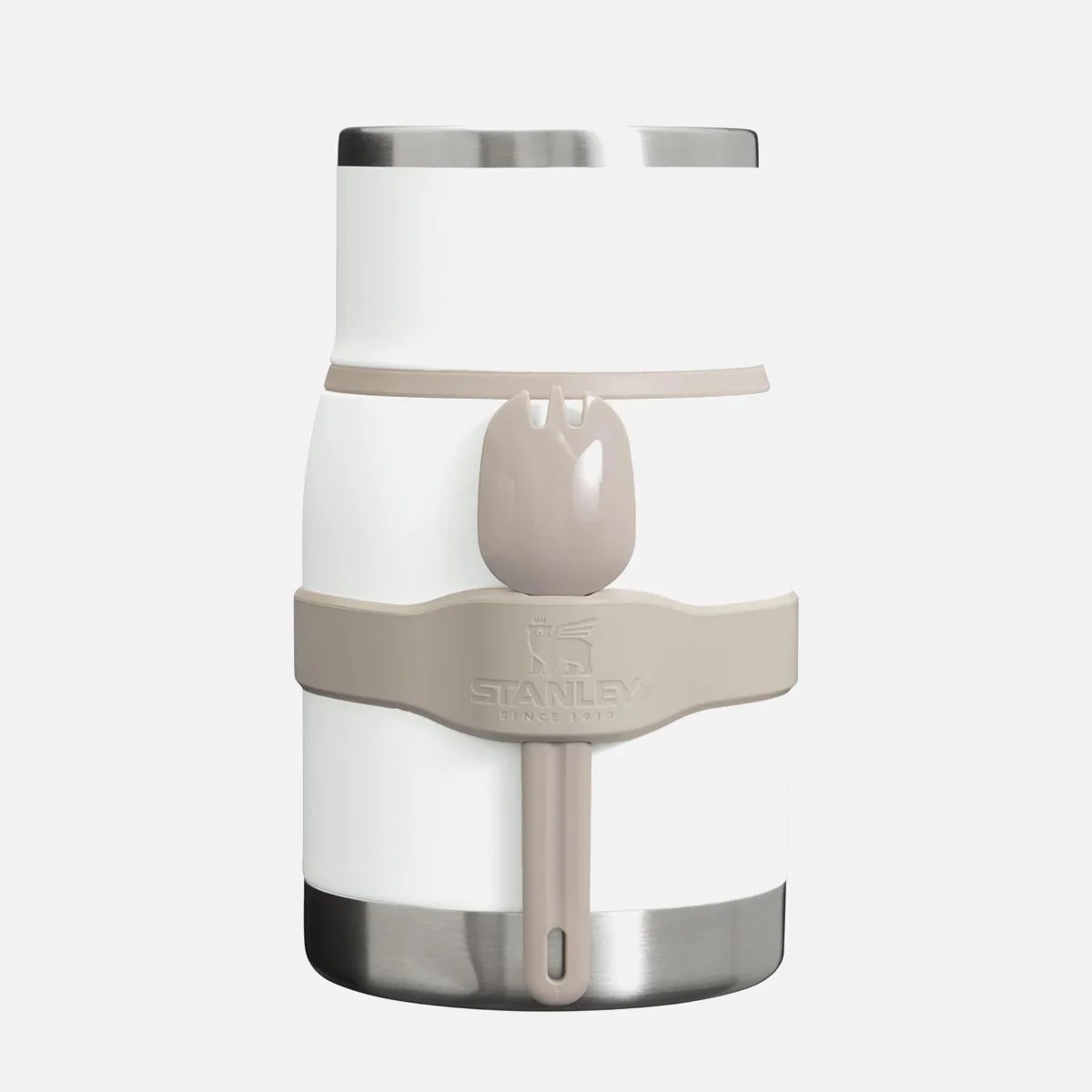 White and stainless steel Stanley insulated food jar with a beige spork attached by a silicone band.