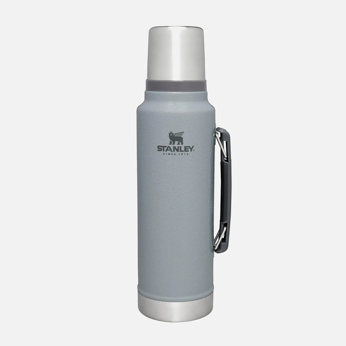 Gray Stanley vacuum insulated thermos with black handle and silver cup lid.