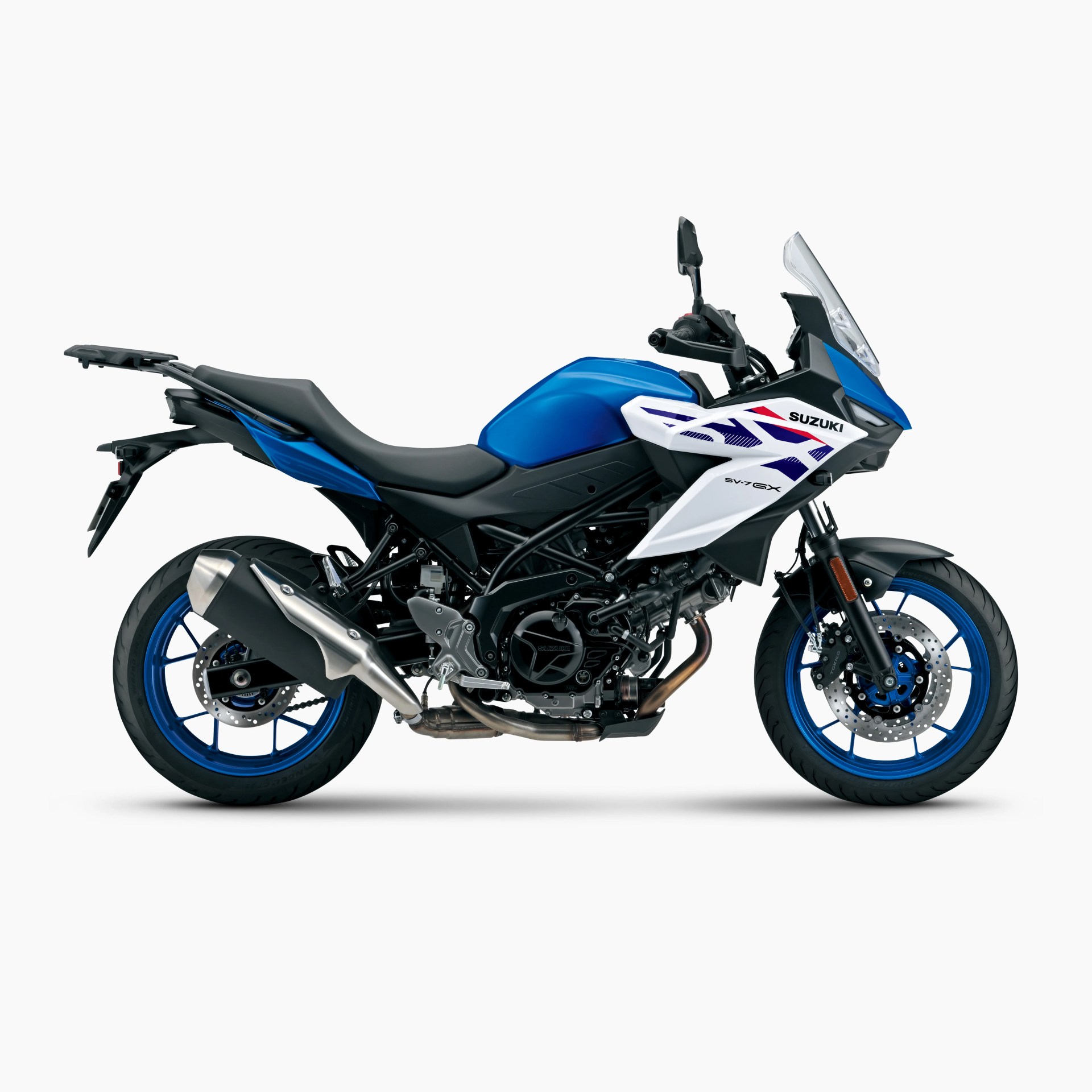 Blue and white Suzuki SV-7 GX motorcycle with black frame and blue wheels on a white background.