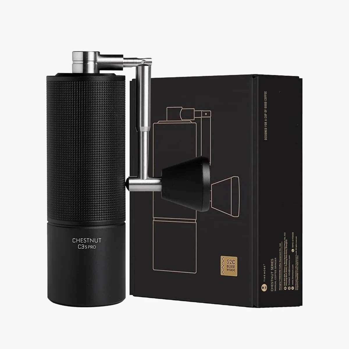 Black Chestnut C3S Pro manual coffee grinder with metal handle next to its black packaging box.
