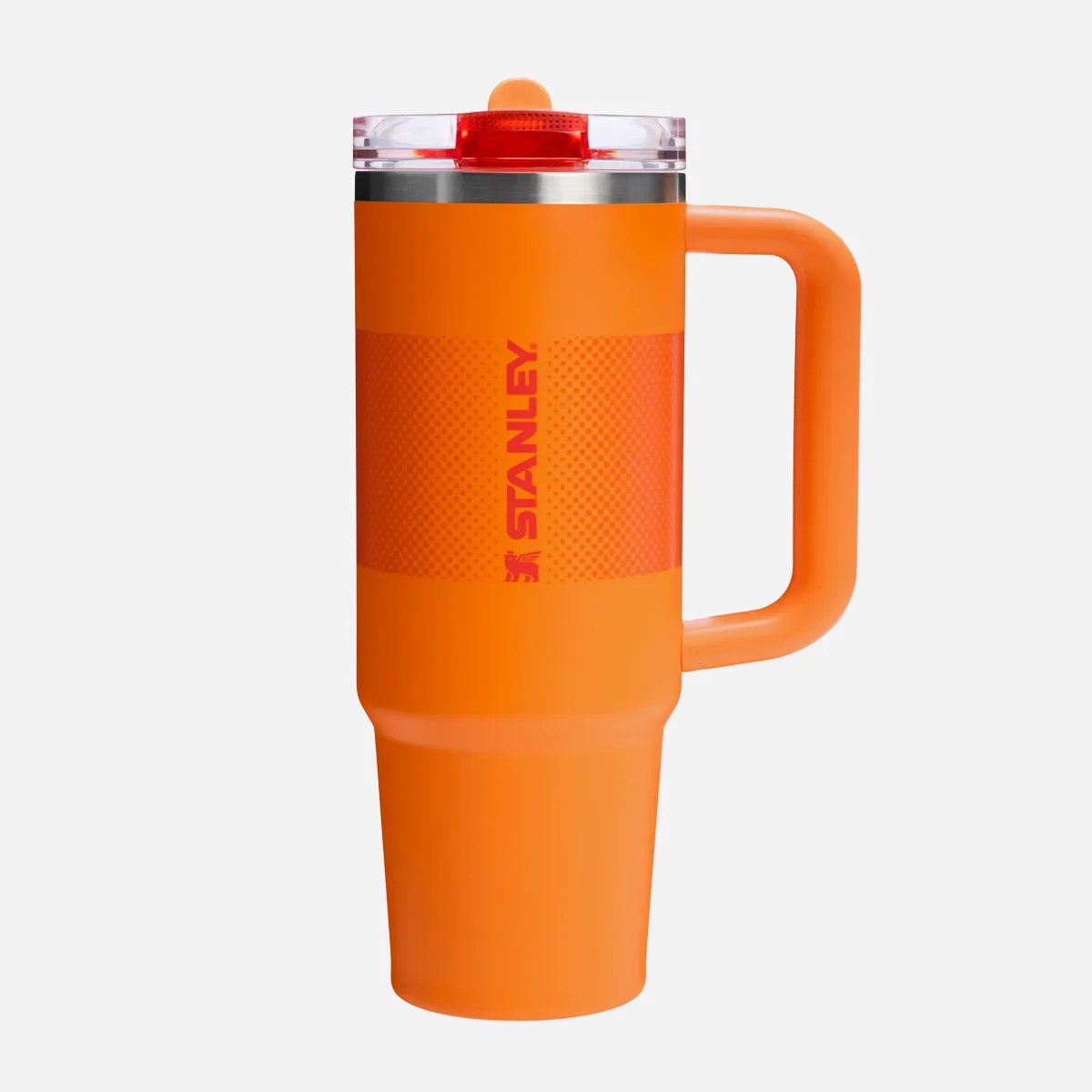 Tall orange Stanley insulated travel mug with handle and clear lid.