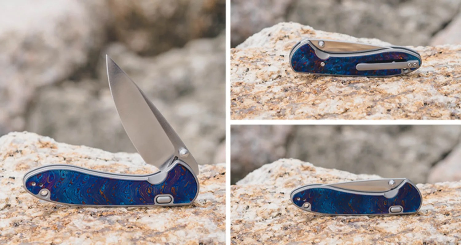 Folding pocket knife with a blue patterned handle shown open and closed on a textured rock surface.