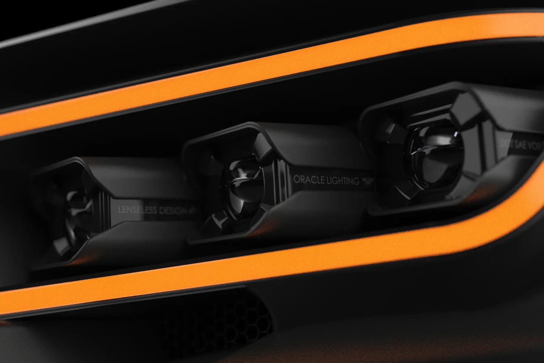 Close-up of three black lensless LED lights with "Oracle Lighting" branding, framed by an orange trim.