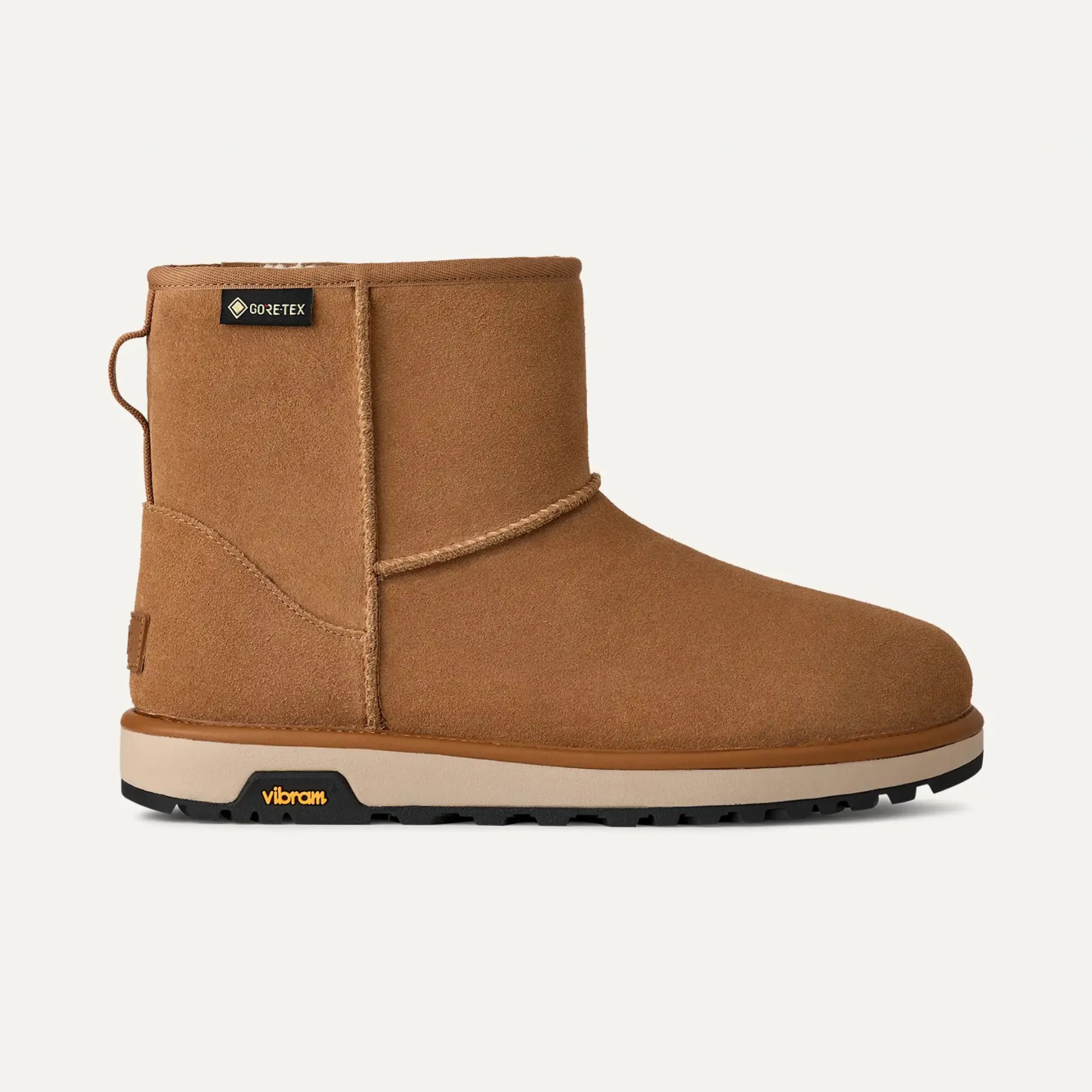 Chestnut brown suede ankle boot with Gore-Tex tag and Vibram sole on a white background.